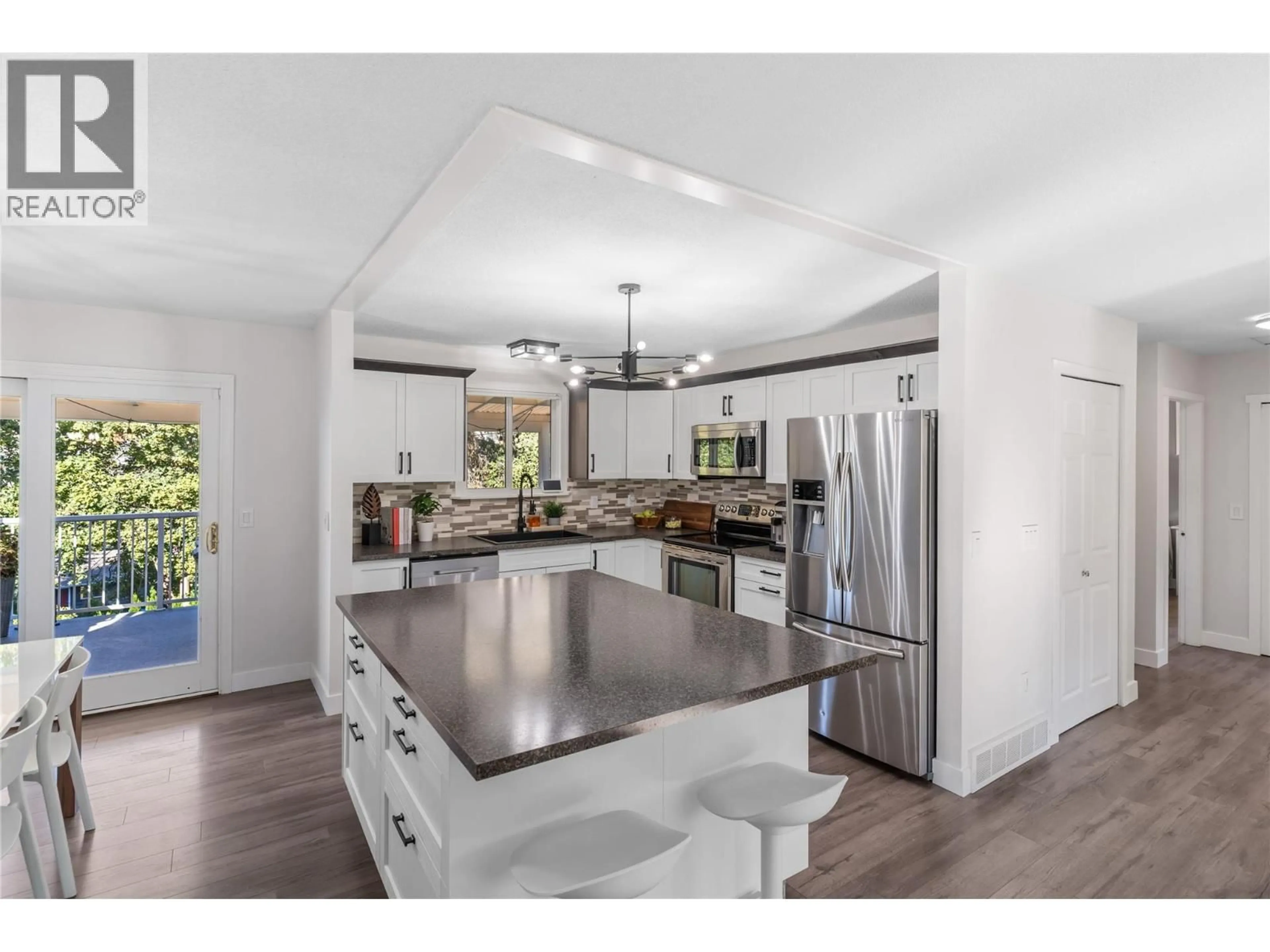 Open concept kitchen, unknown for 1758 SUNRISE ROAD, Kelowna British Columbia V1P1G3