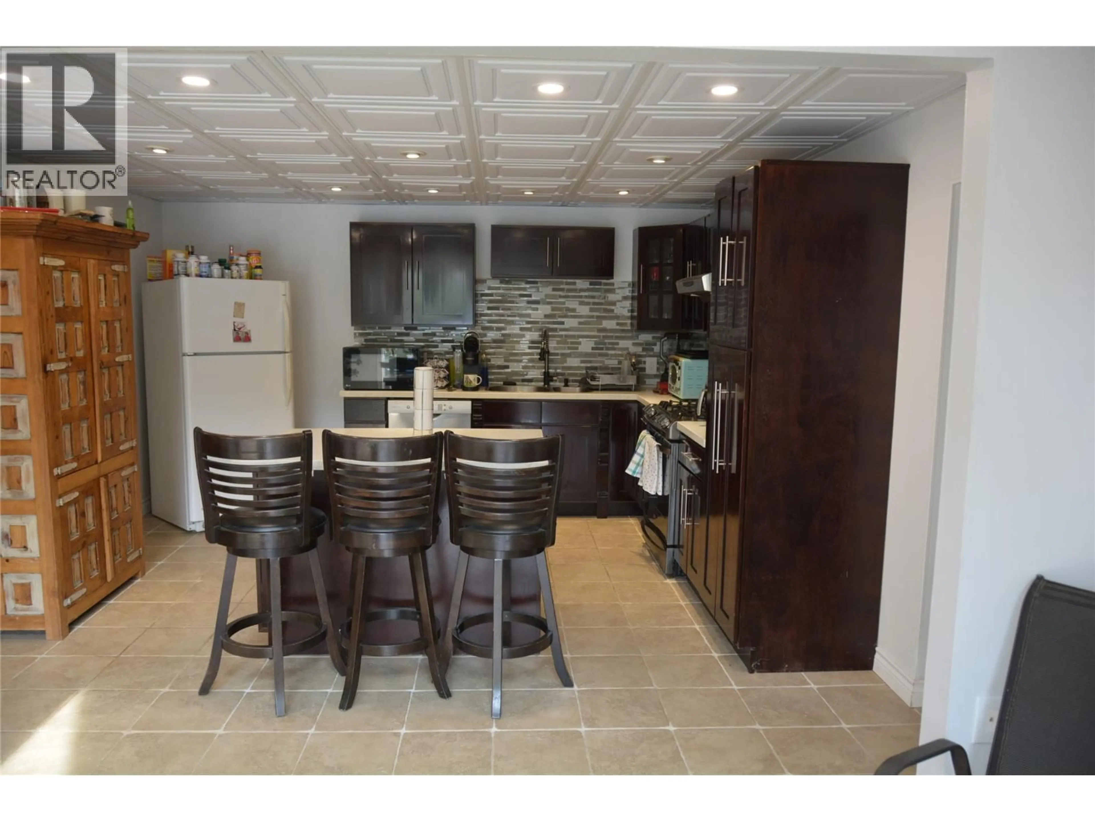 Open concept kitchen, ceramic/tile floor for 2225 BARBARA AVENUE, Kamloops British Columbia V2B4J4