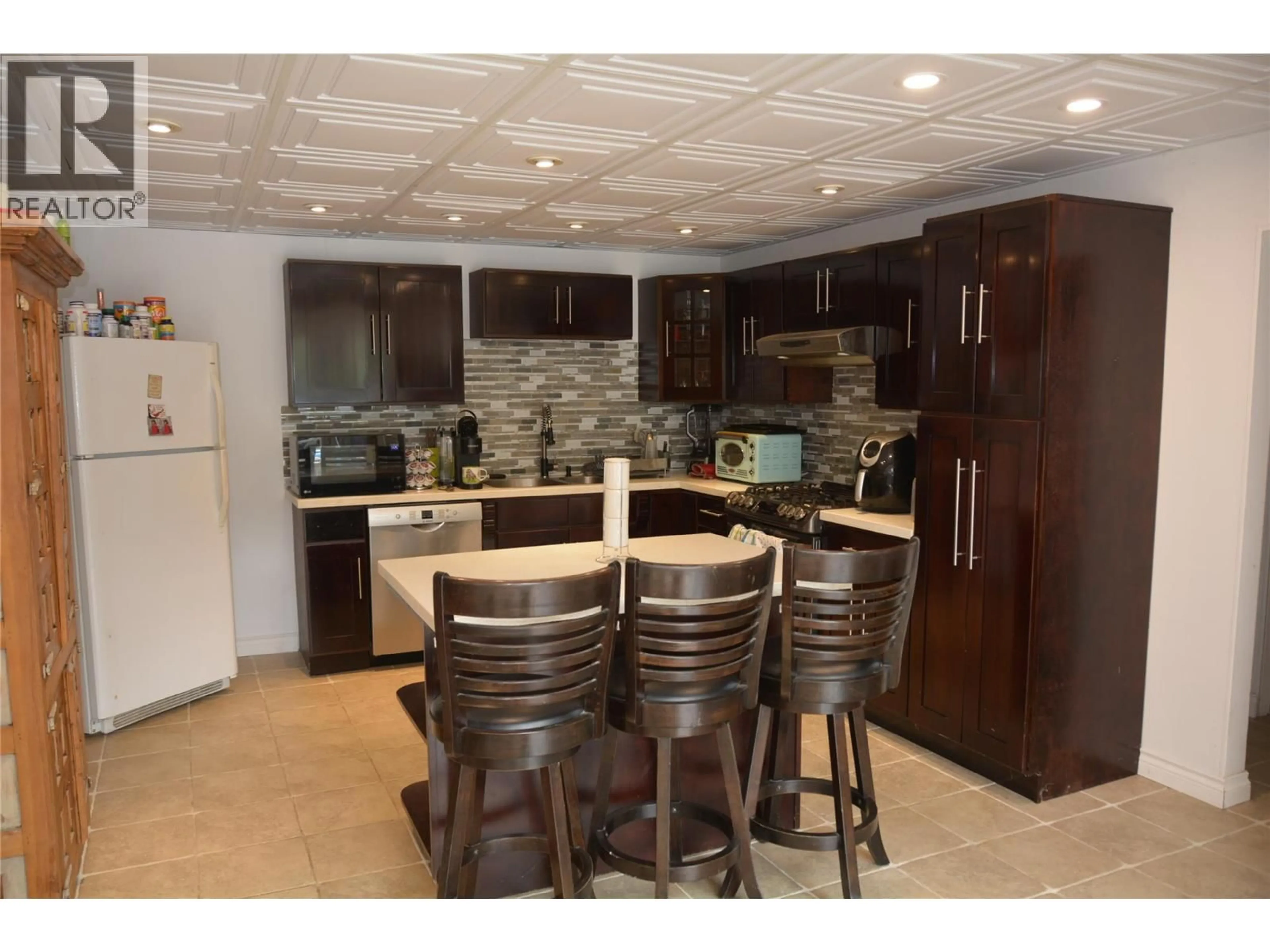 Open concept kitchen, ceramic/tile floor for 2225 BARBARA AVENUE, Kamloops British Columbia V2B4J4