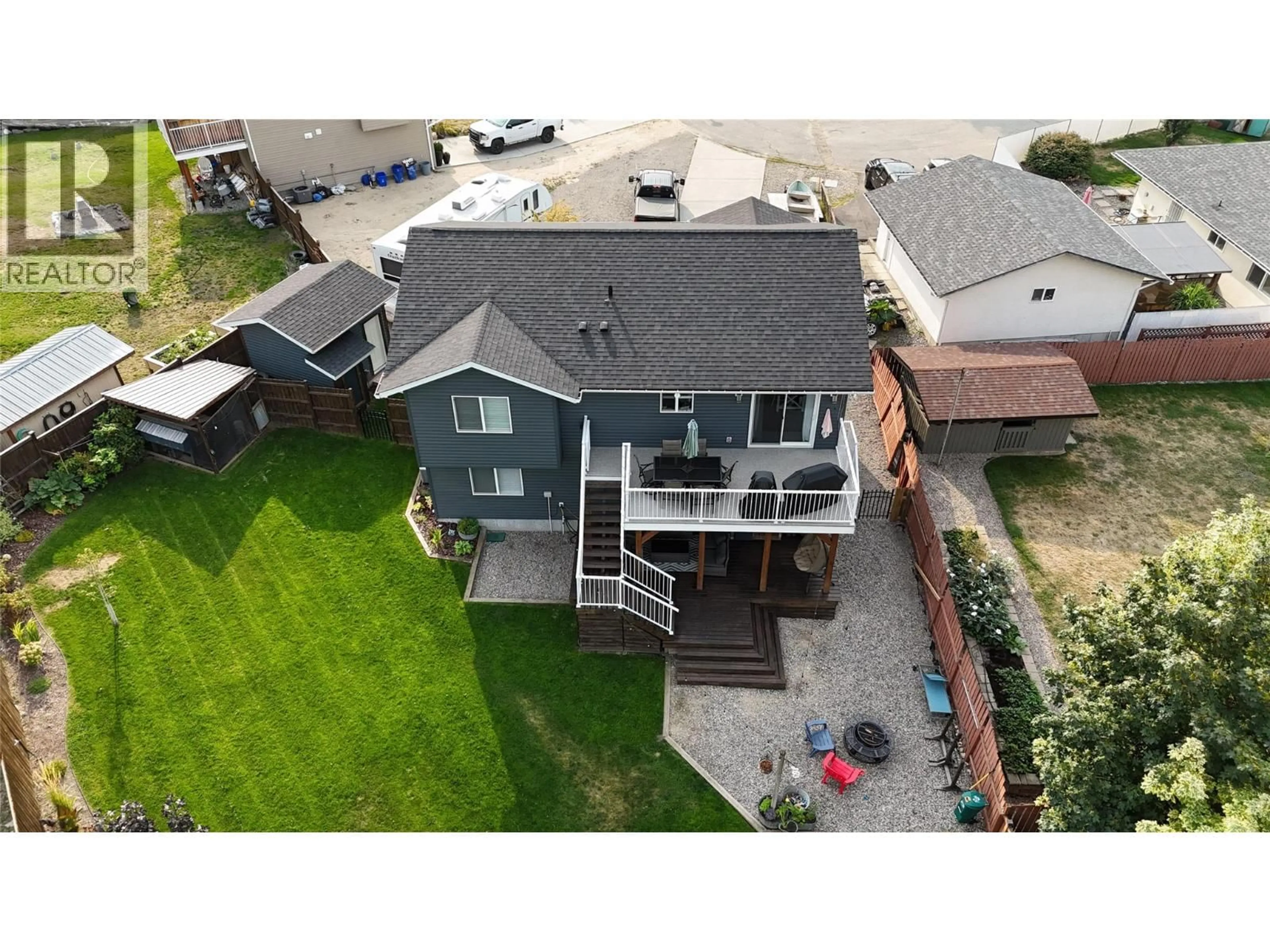 A pic from outside/outdoor area/front of a property/back of a property/a pic from drone, street for 251 GOLDEN WAY, Grand Forks British Columbia V0H1H0
