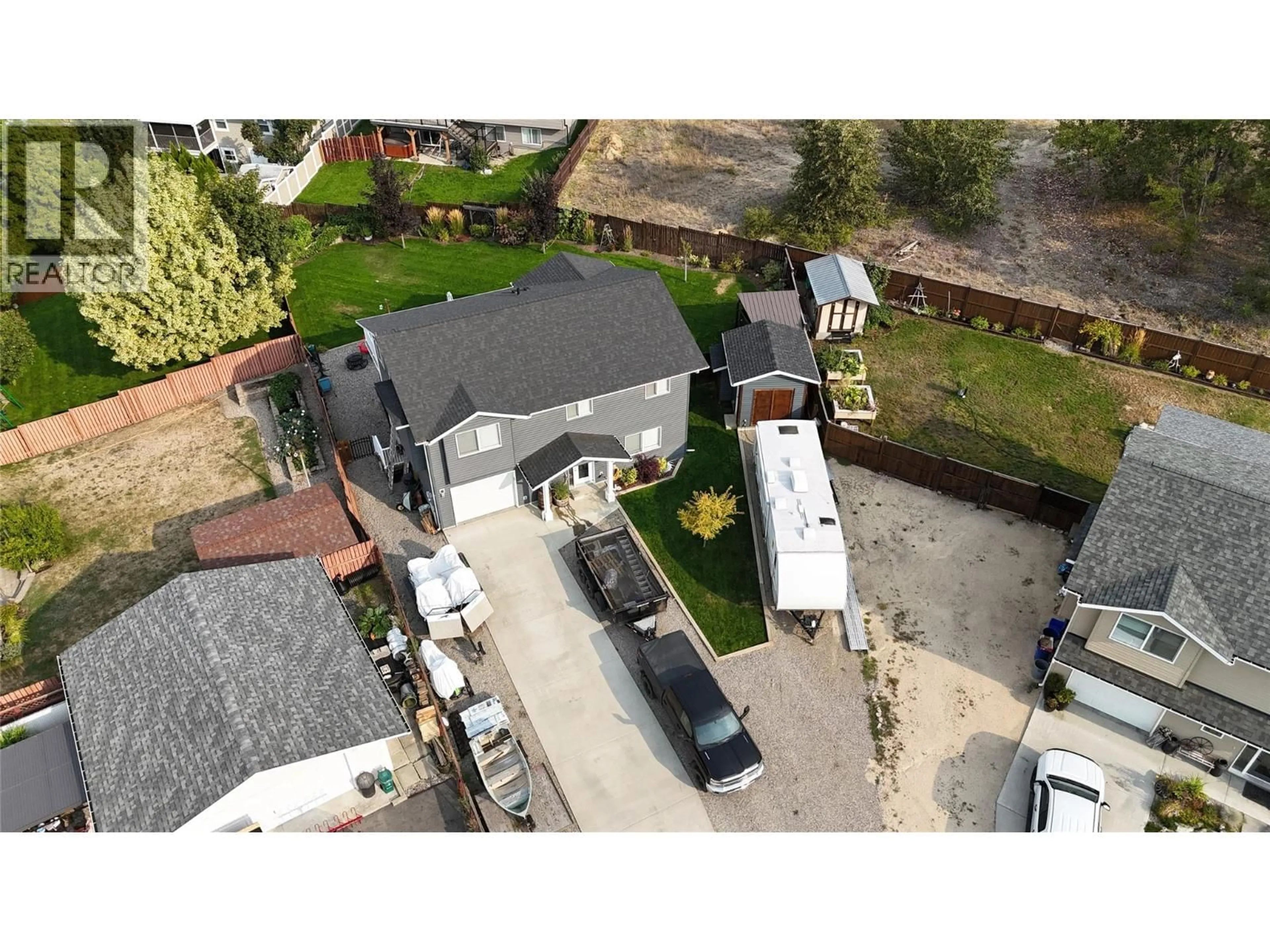 A pic from outside/outdoor area/front of a property/back of a property/a pic from drone, street for 251 GOLDEN WAY, Grand Forks British Columbia V0H1H0