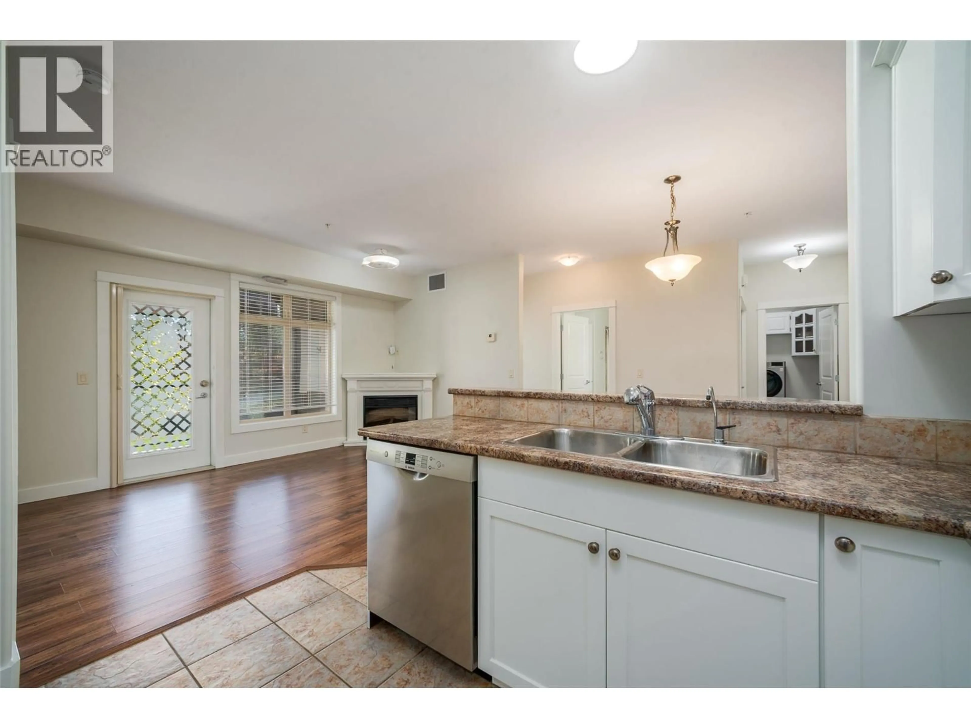 Open concept kitchen, ceramic/tile floor for 109 - 2611 STILLWATER WAY, Lake Country British Columbia V4V2R3