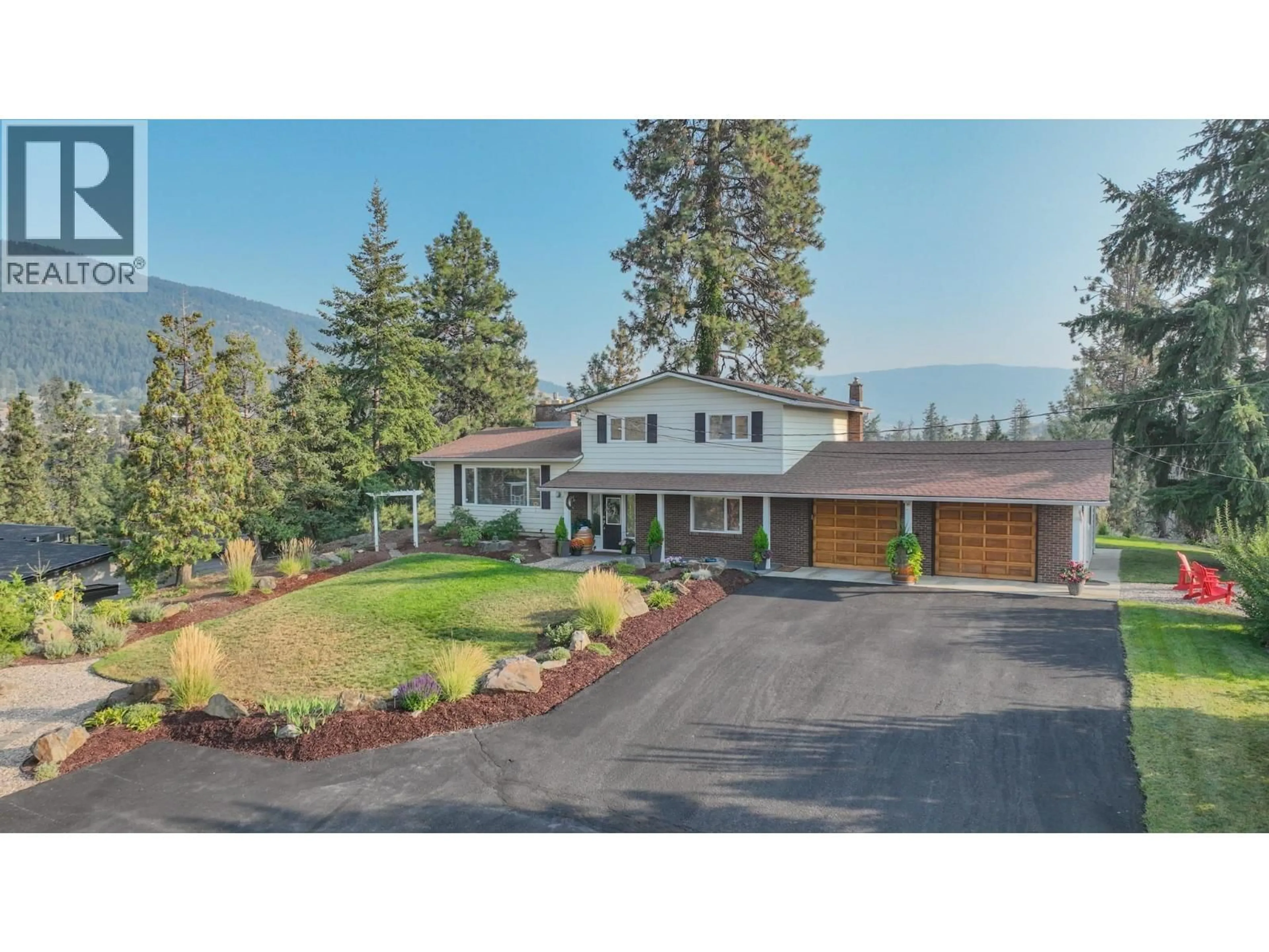 A pic from outside/outdoor area/front of a property/back of a property/a pic from drone, mountain view for 5290 SILVER STAR ROAD, Vernon British Columbia V1B3K4
