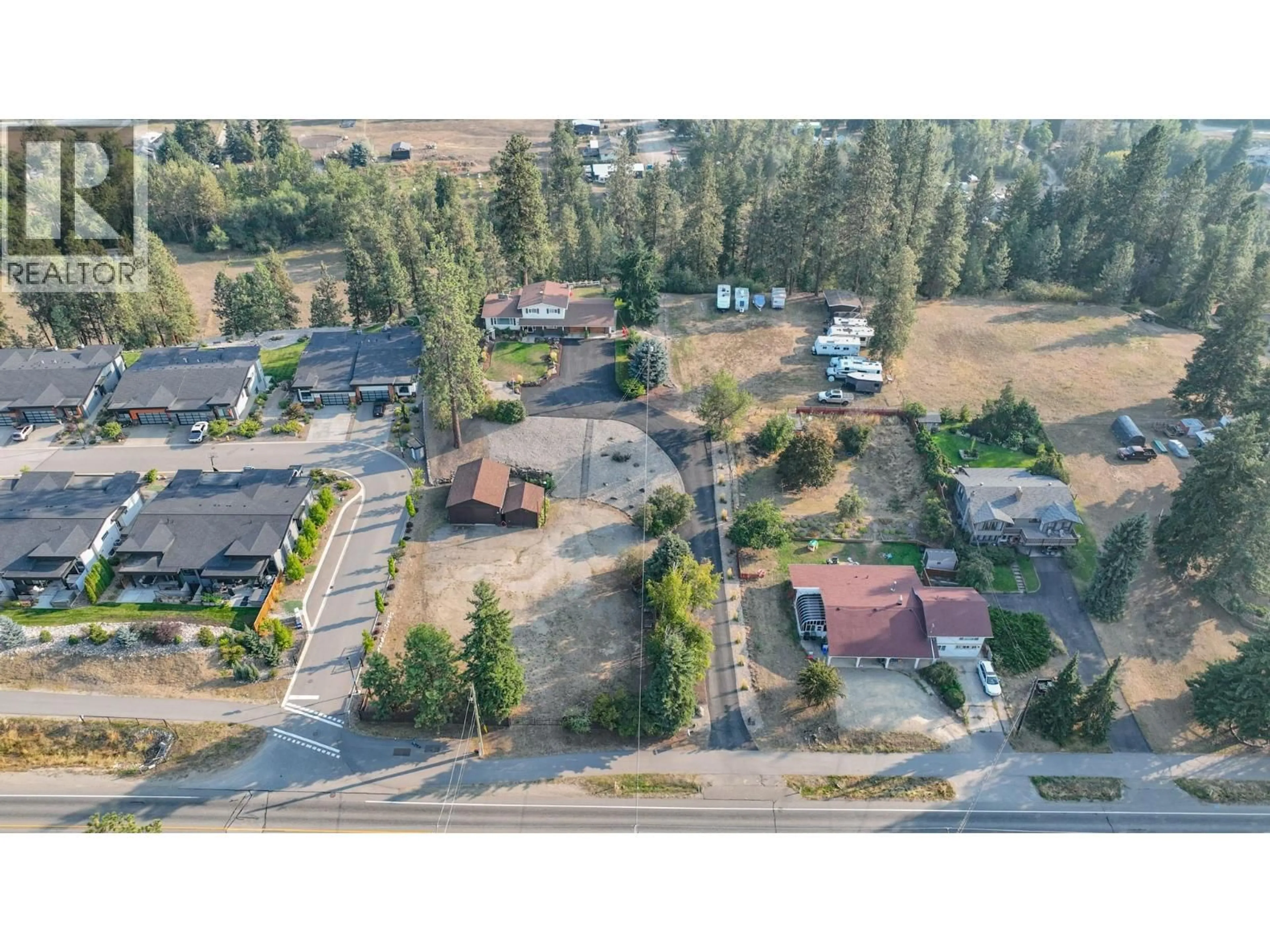 A pic from outside/outdoor area/front of a property/back of a property/a pic from drone, street for 5290 SILVER STAR ROAD, Vernon British Columbia V1B3K4