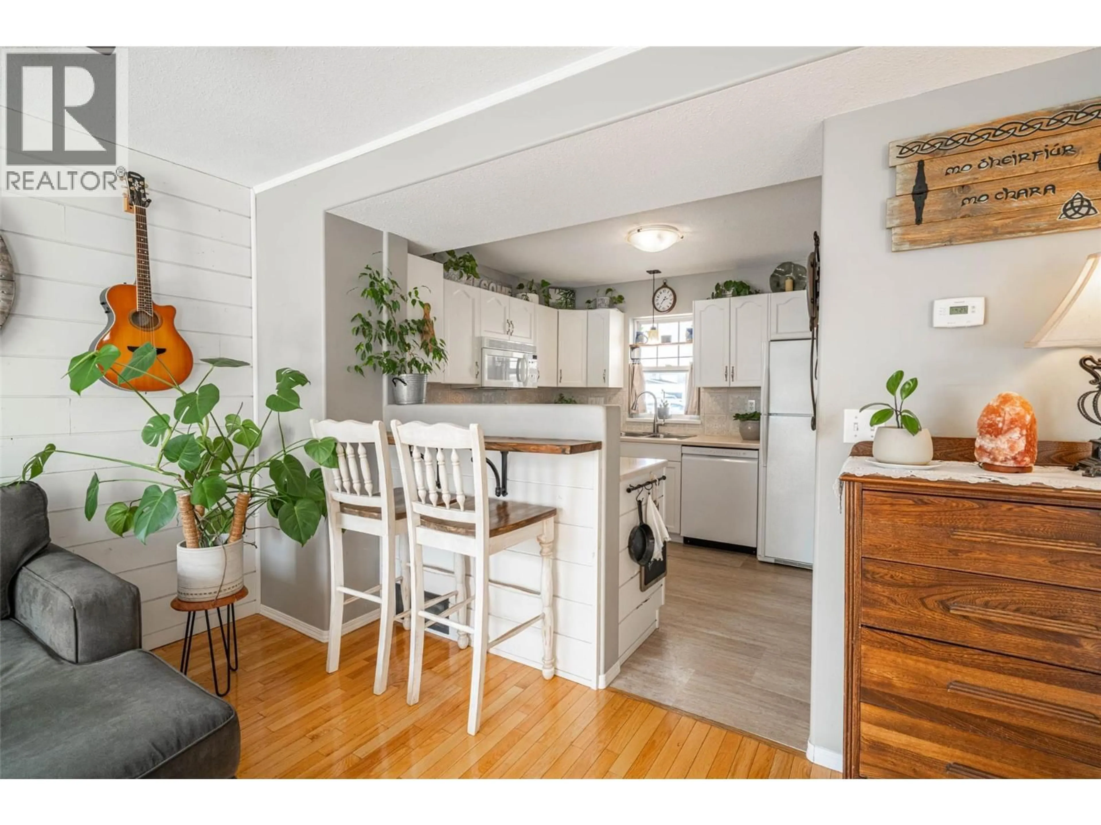 Open concept kitchen, wood/laminate floor for 31 - 2395 PLEASANT VALLEY ROAD, Armstrong British Columbia V0E1B2