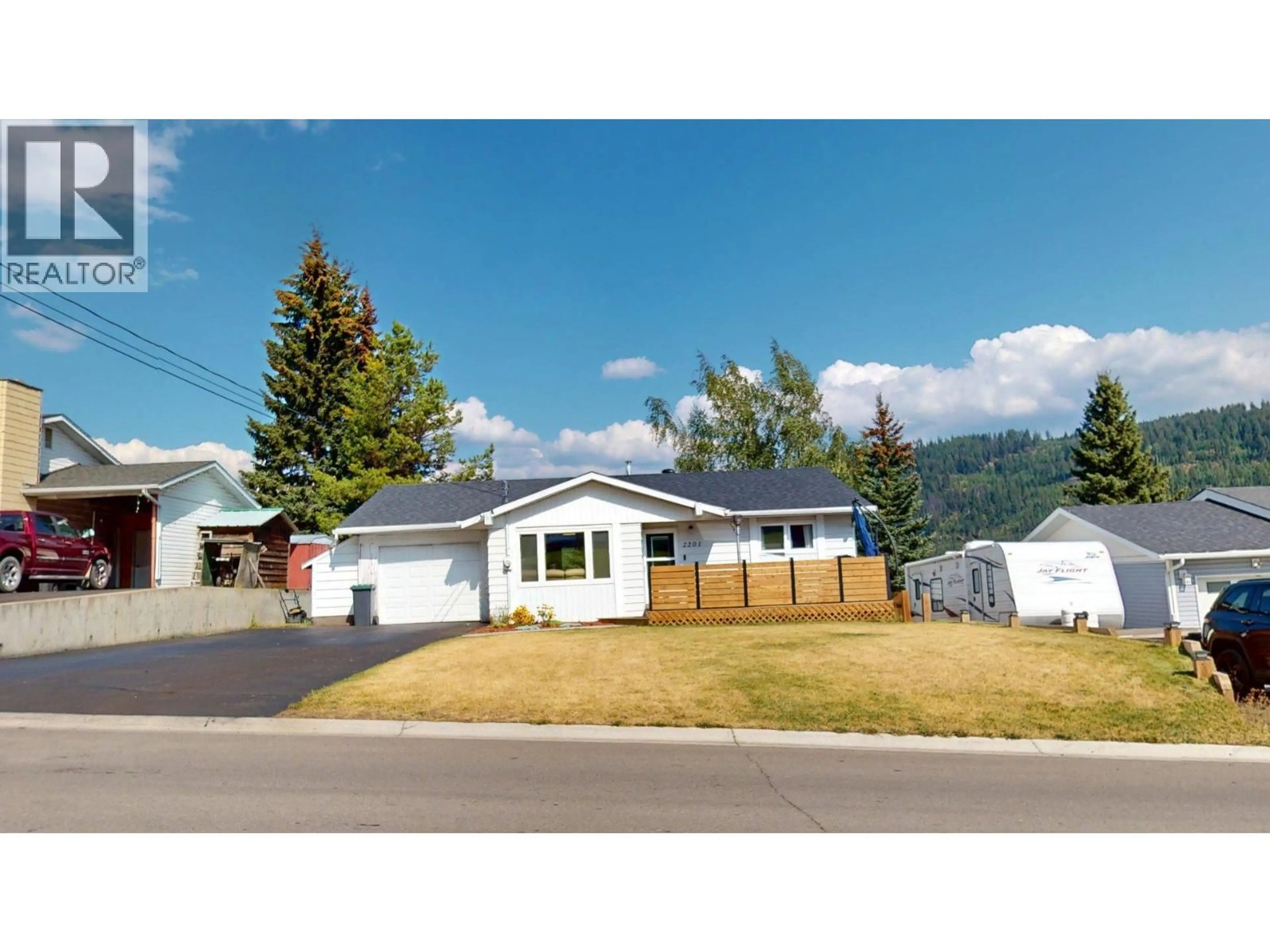 Home with vinyl exterior material, mountain view for 2201 ALMOND STREET, Elkford British Columbia V0B1H0