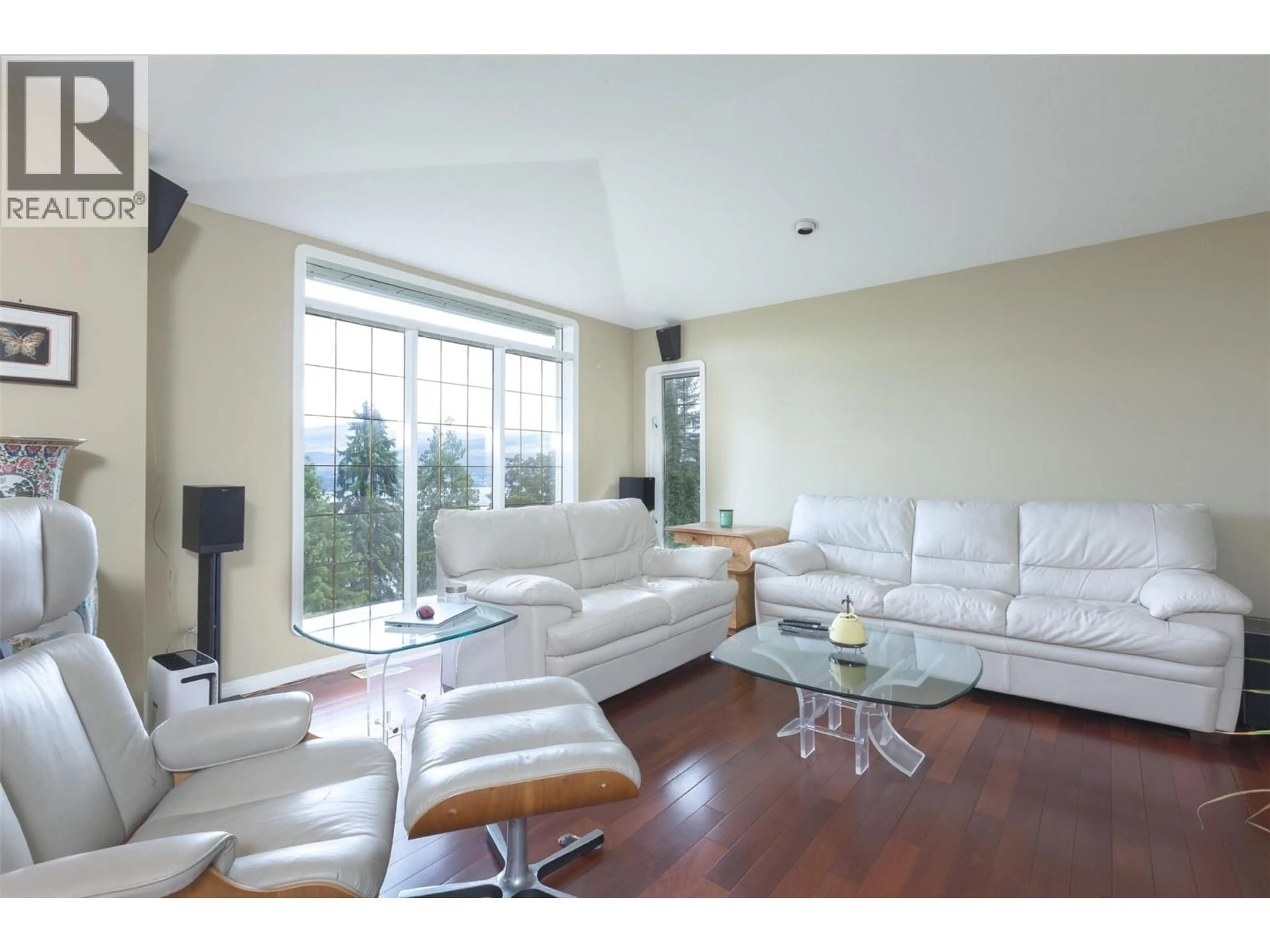 Living room with furniture, wood/laminate floor for 1201 TREVOR DRIVE, West Kelowna British Columbia V1Z3K7