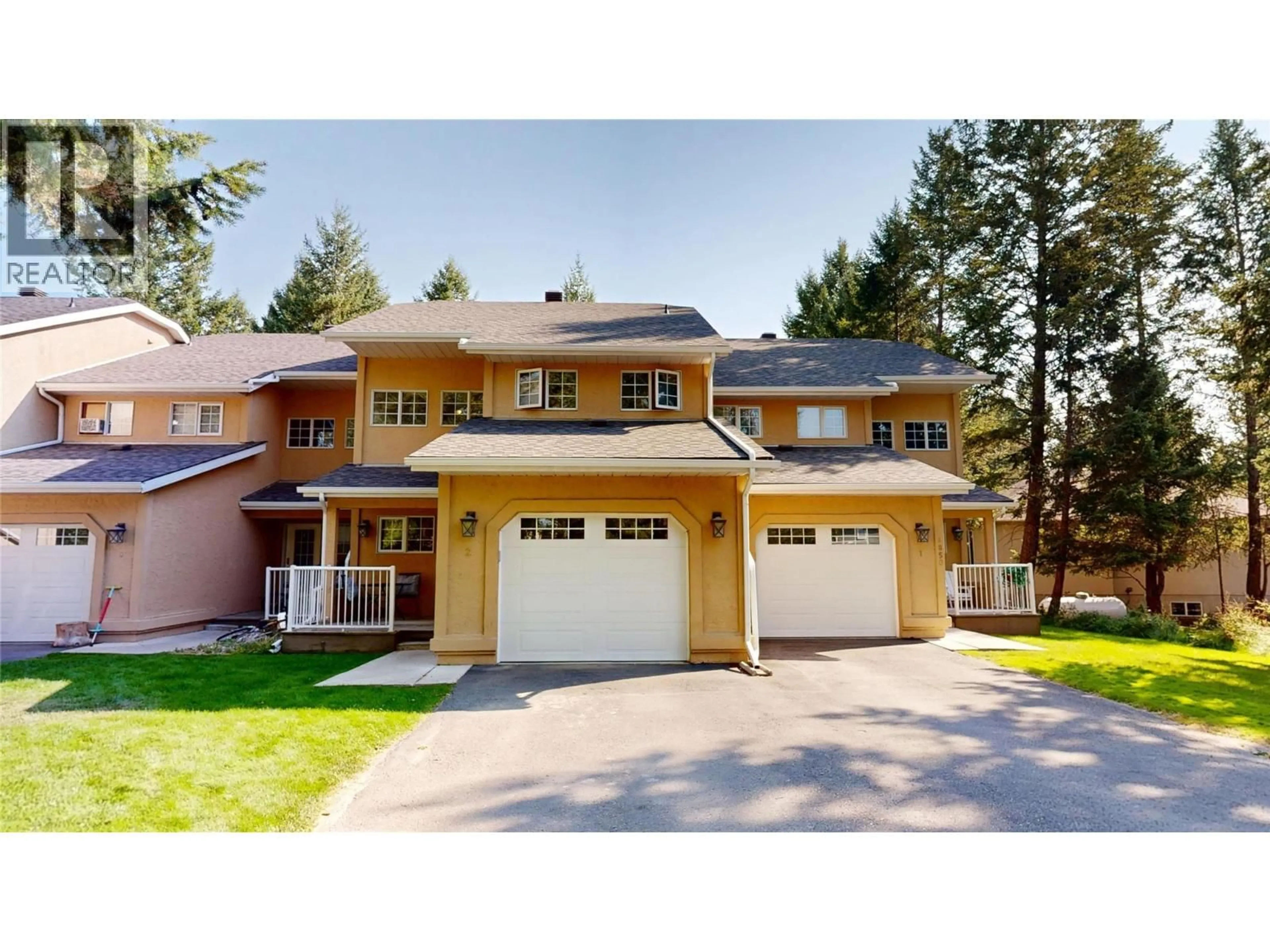 Home with vinyl exterior material, street for 2 - 4850 MCKAY STREET, Radium Hot Springs British Columbia V0A1M0