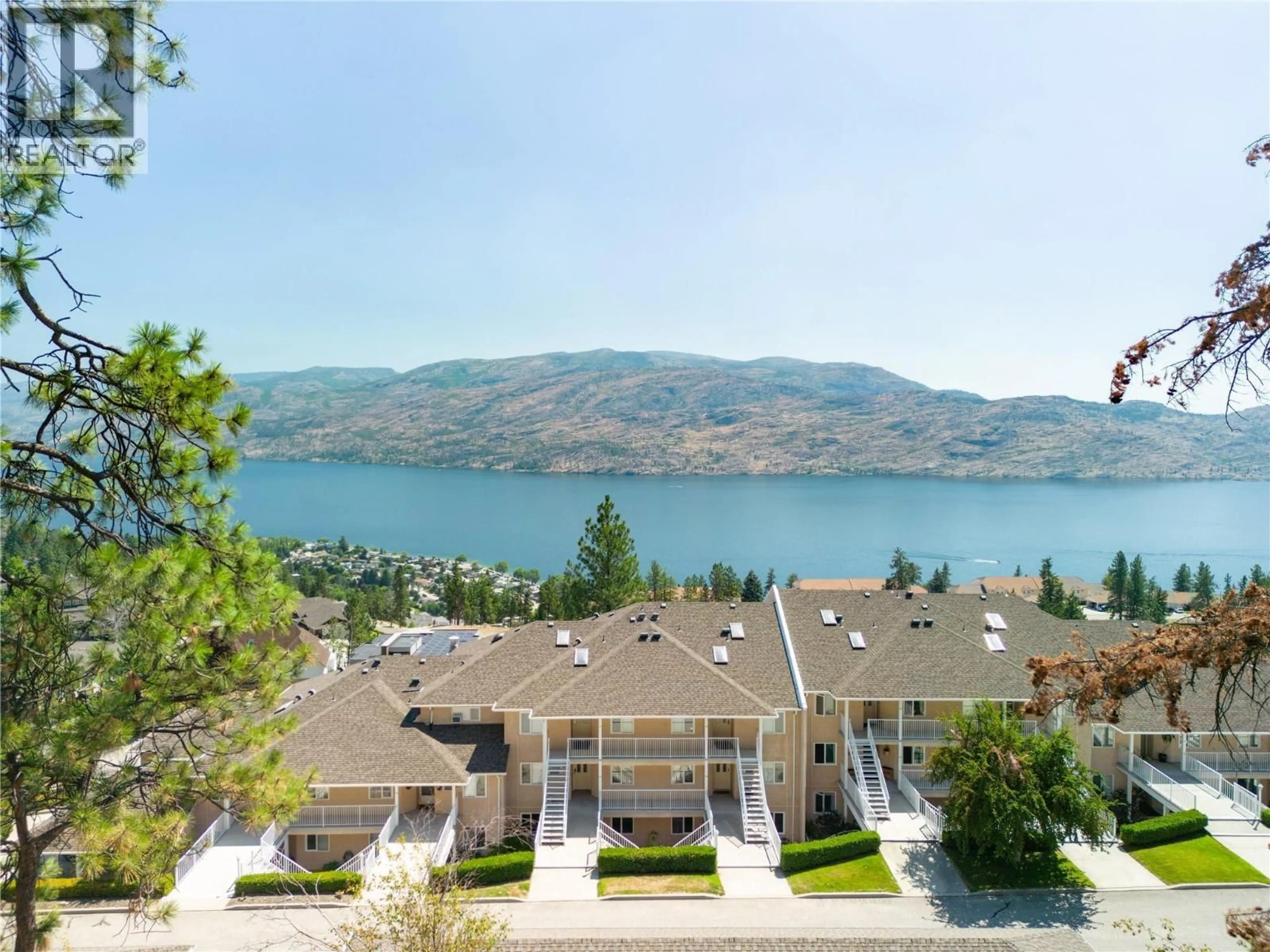 A pic from outside/outdoor area/front of a property/back of a property/a pic from drone, water/lake/river/ocean view for 308 - 4630 PONDEROSA DRIVE, Peachland British Columbia V0X1H5