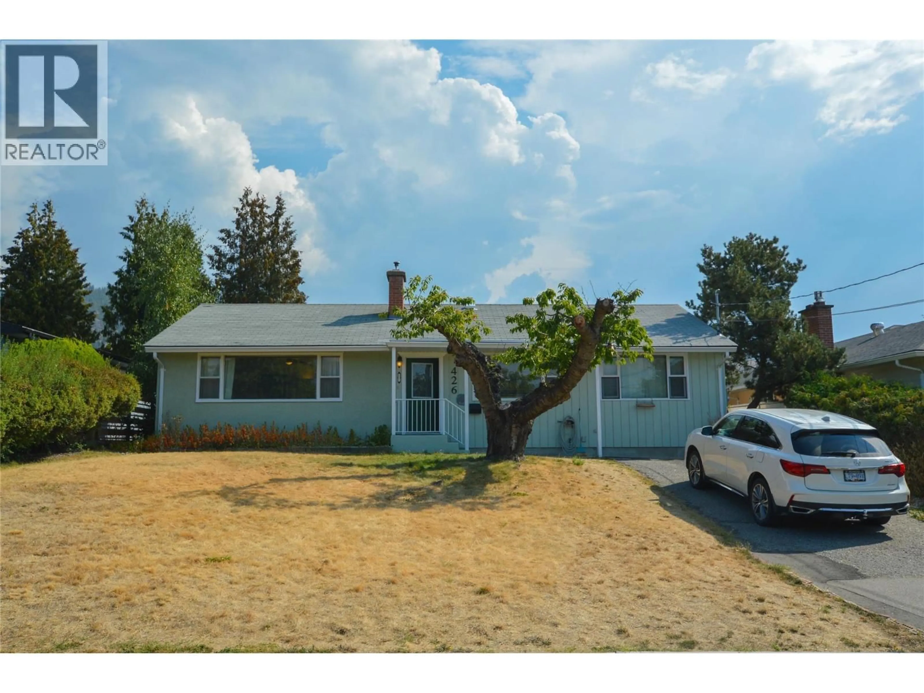 A pic from outside/outdoor area/front of a property/back of a property/a pic from drone, street for 426 TRURO STREET, Penticton British Columbia V2A4C7