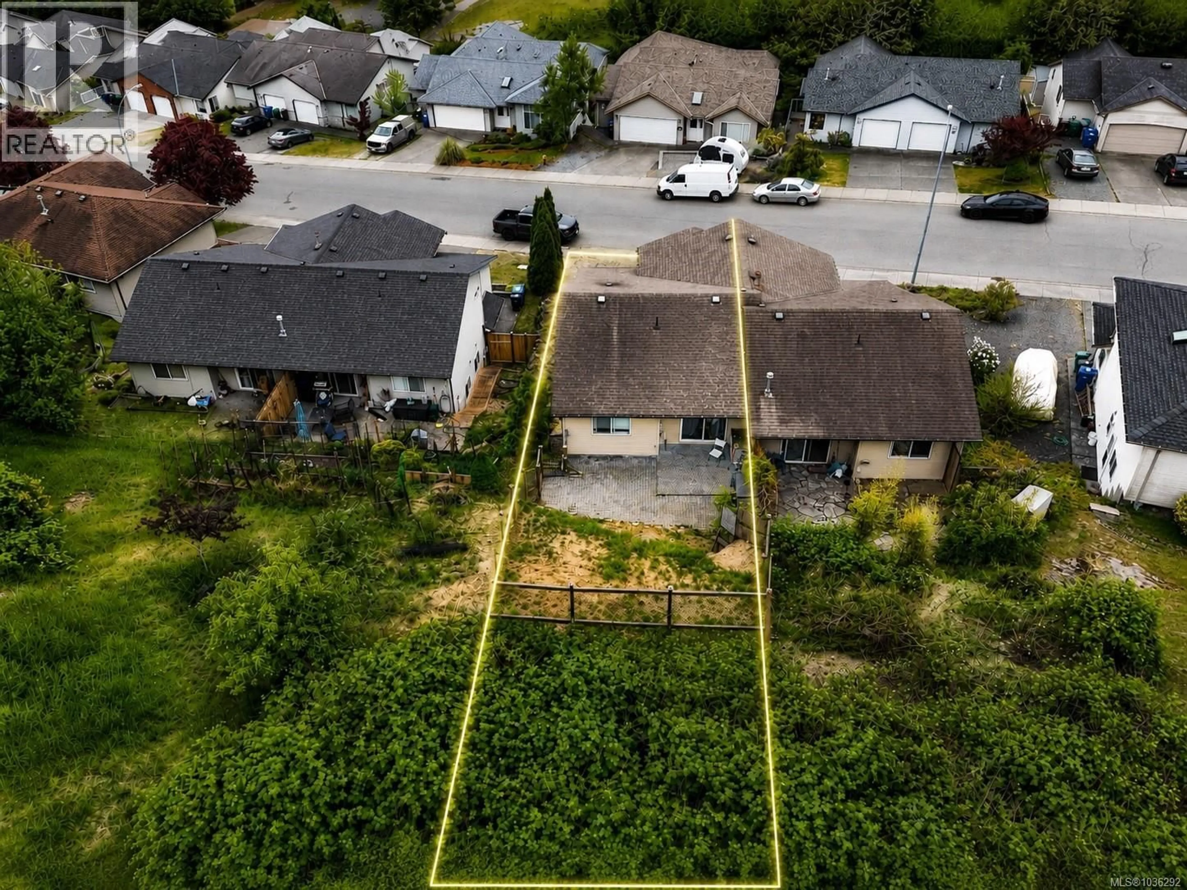 A pic from outside/outdoor area/front of a property/back of a property/a pic from drone, street for 4780 FAIRBROOK CRESCENT, Nanaimo British Columbia V9T6M6