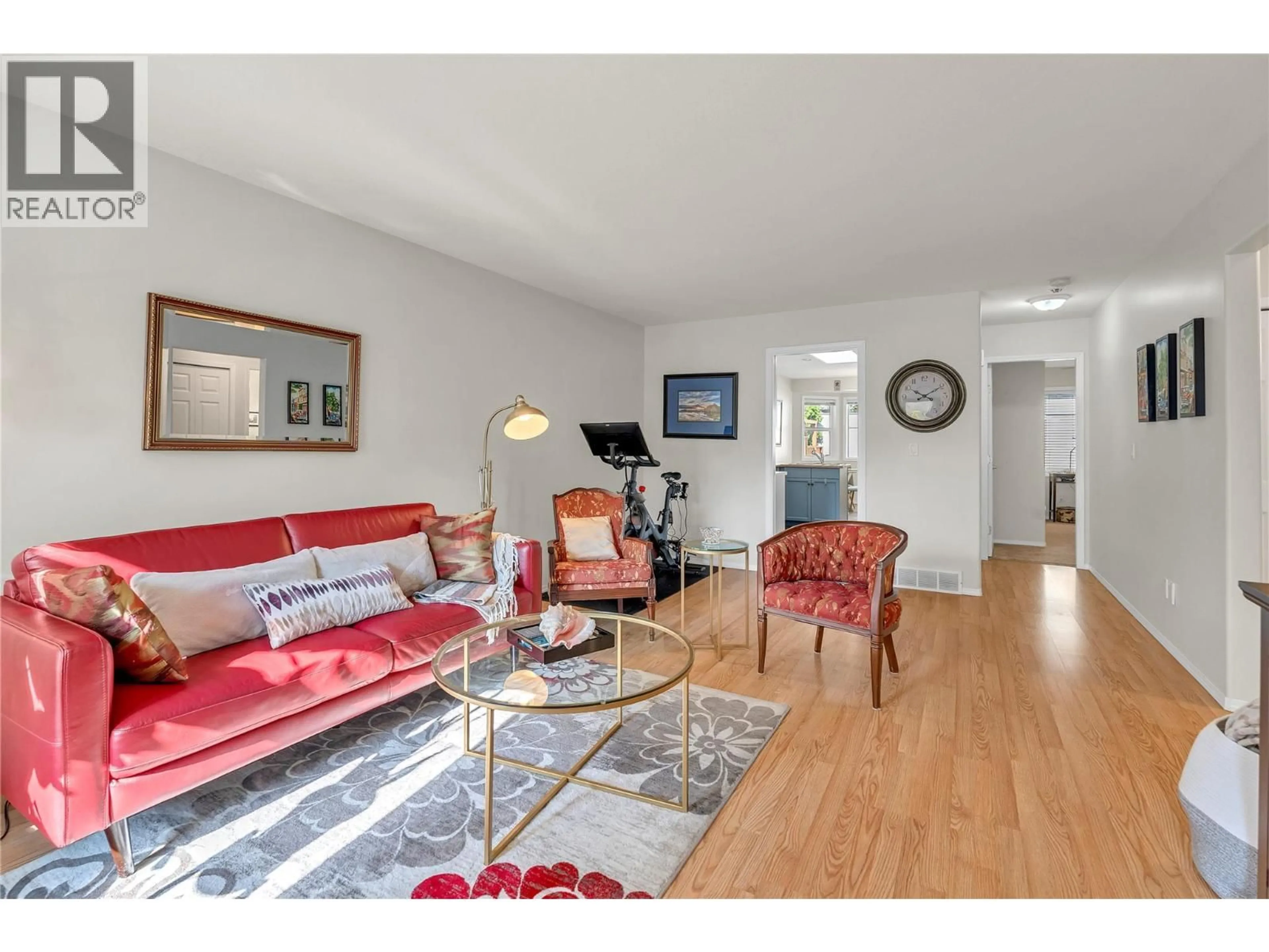 Living room with furniture, wood/laminate floor for 107 - 654 PICKERING STREET, Penticton British Columbia V2A4H2