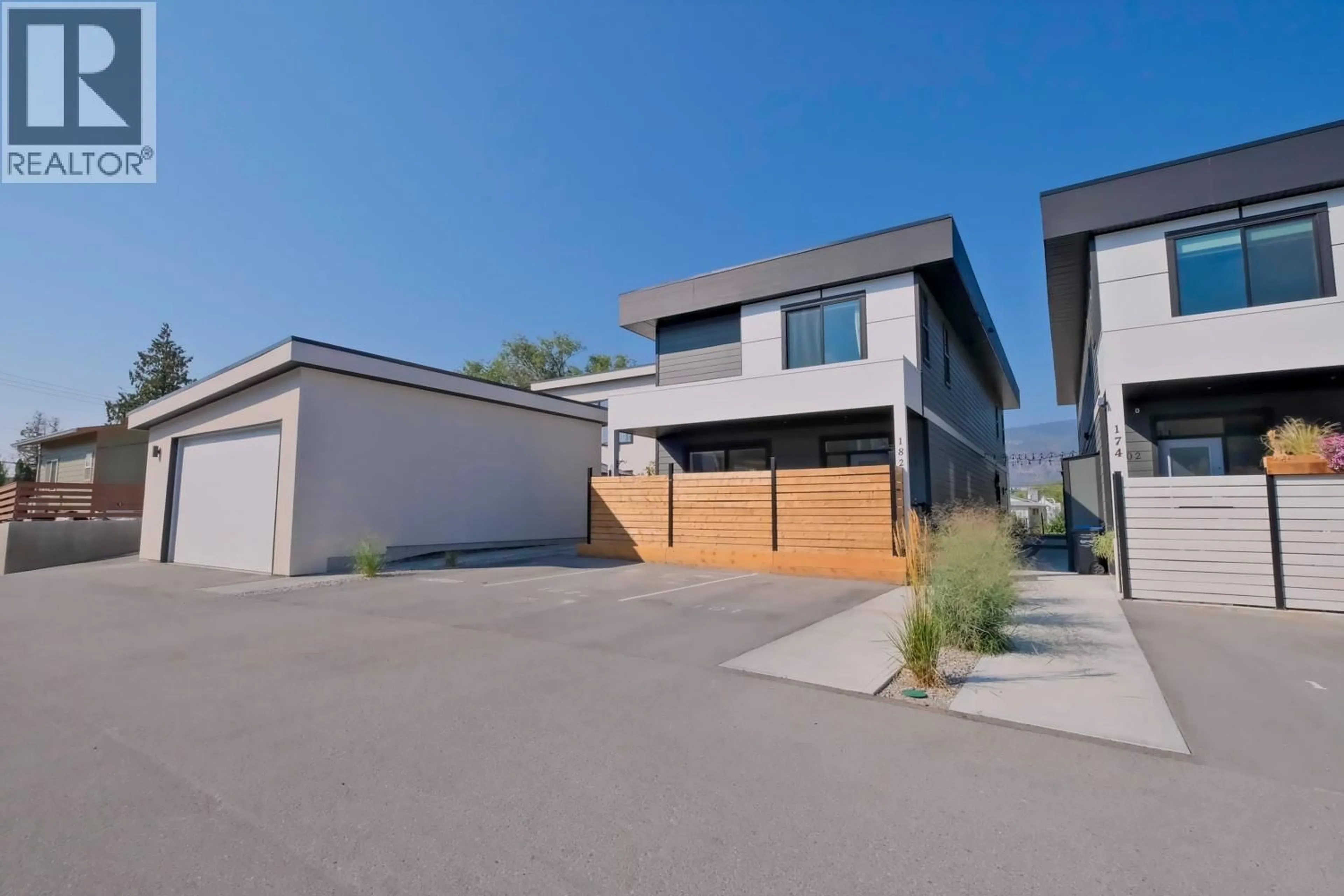 A pic from outside/outdoor area/front of a property/back of a property/a pic from drone, street for 102 - 182 VAN HORNE STREET, Penticton British Columbia V2A4K2
