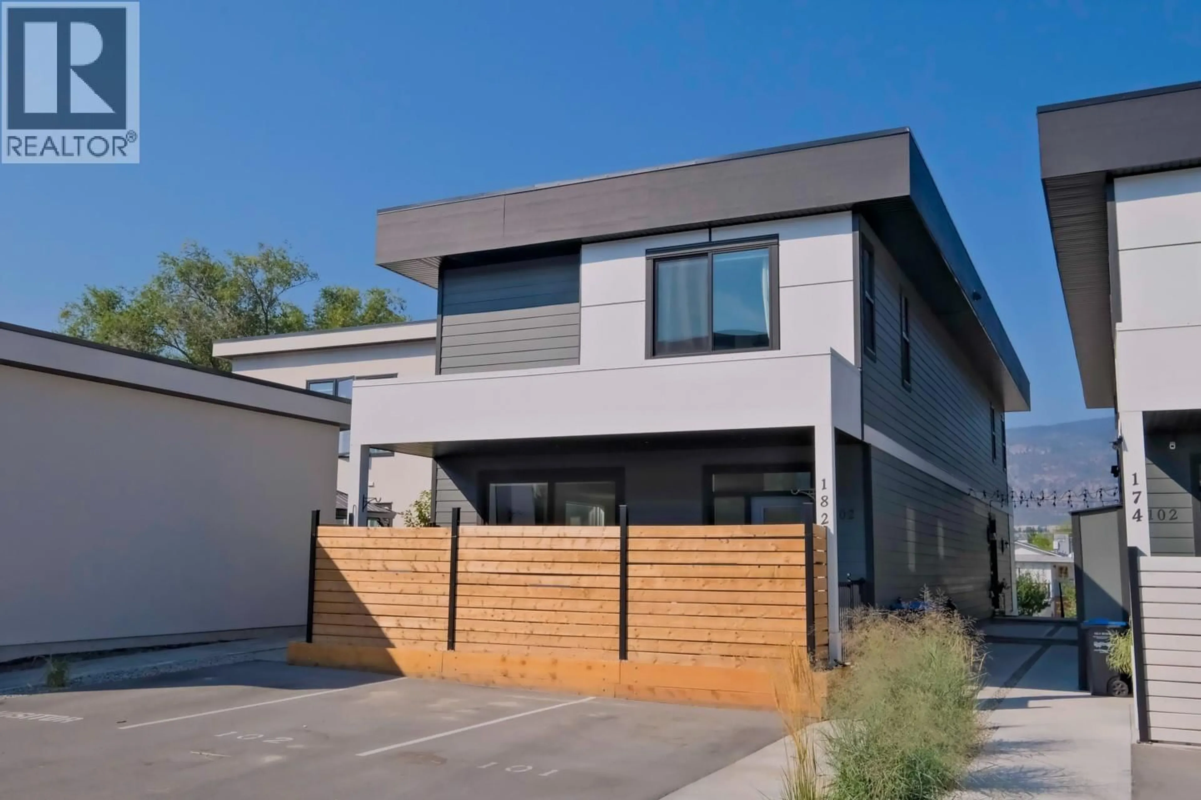 Home with brick exterior material, street for 102 - 182 VAN HORNE STREET, Penticton British Columbia V2A4K2