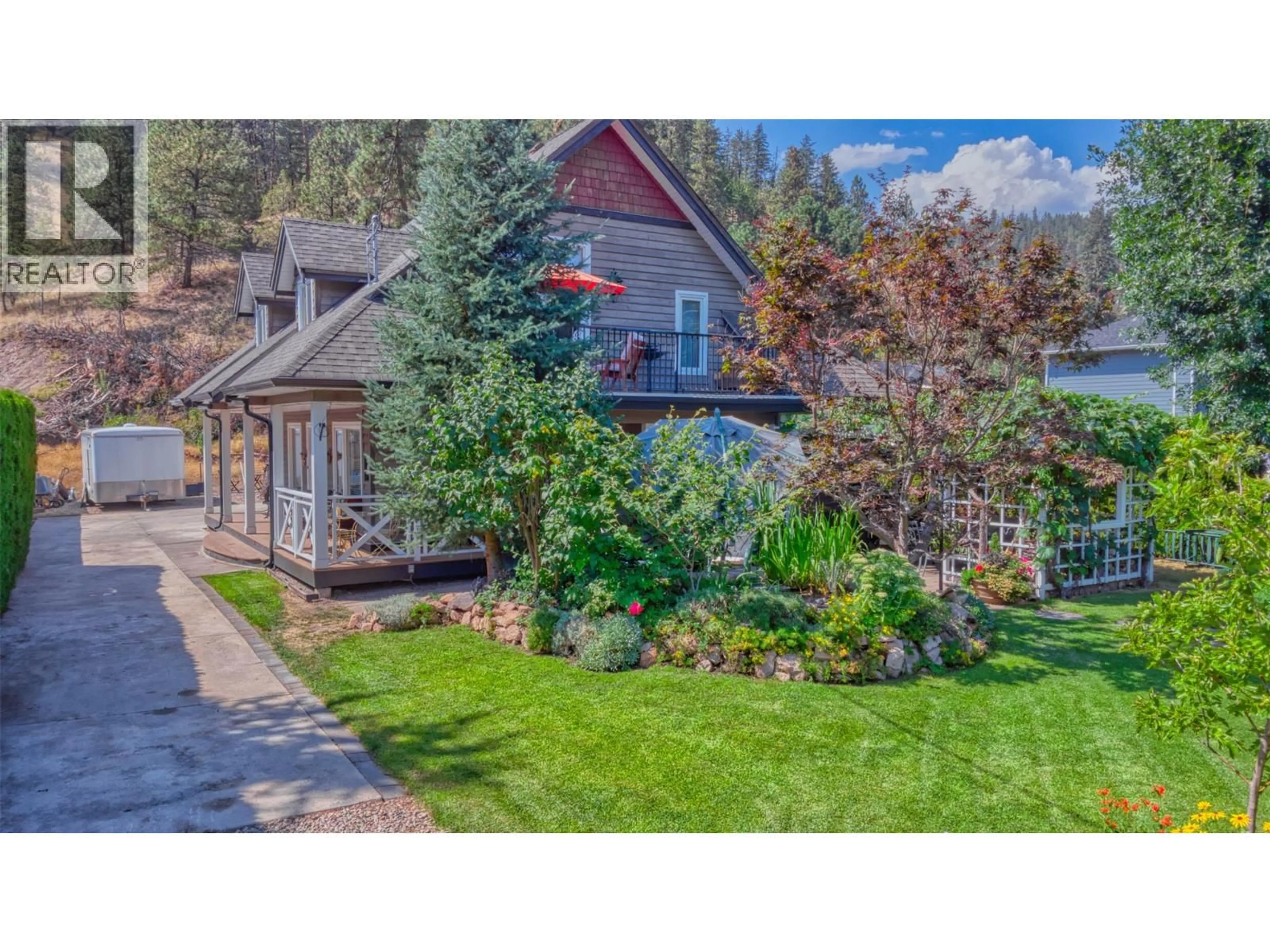 A pic from outside/outdoor area/front of a property/back of a property/a pic from drone, unknown for 7372 FINTRY DELTA ROAD, Kelowna British Columbia V1Z3V2