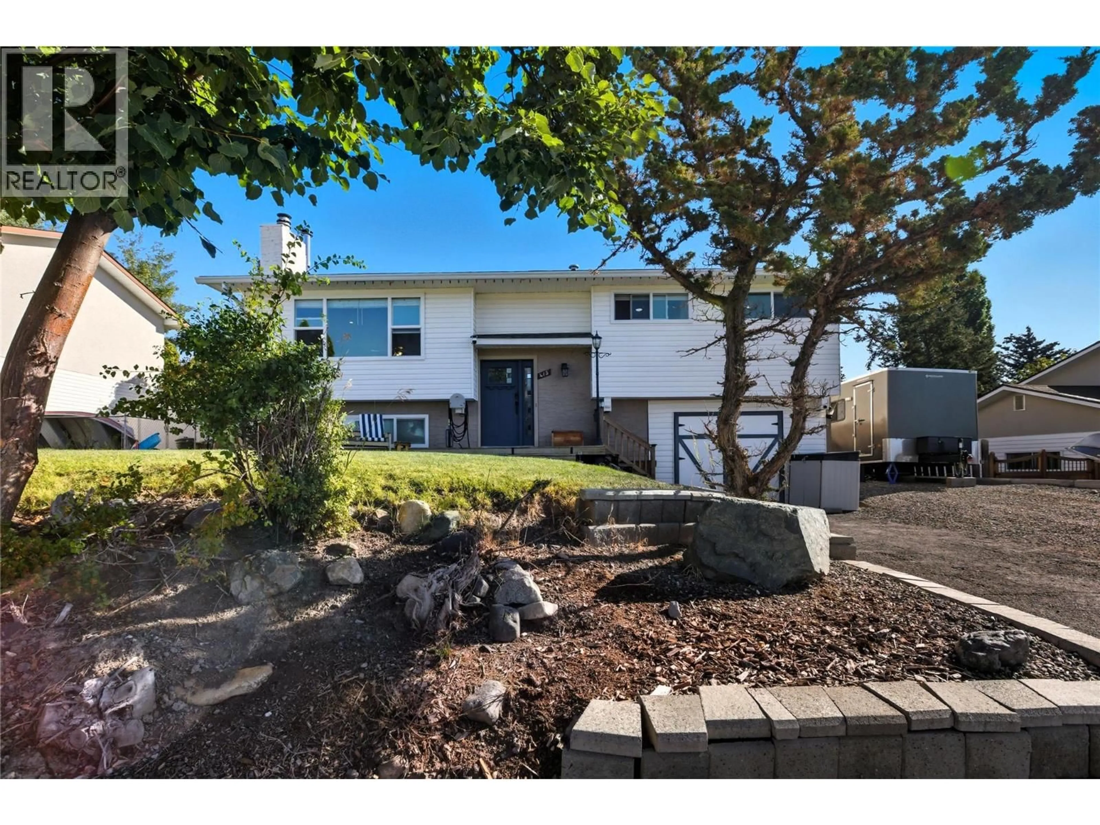 Home with vinyl exterior material, street for 415 OPAL DRIVE, Logan Lake British Columbia V0K1W0