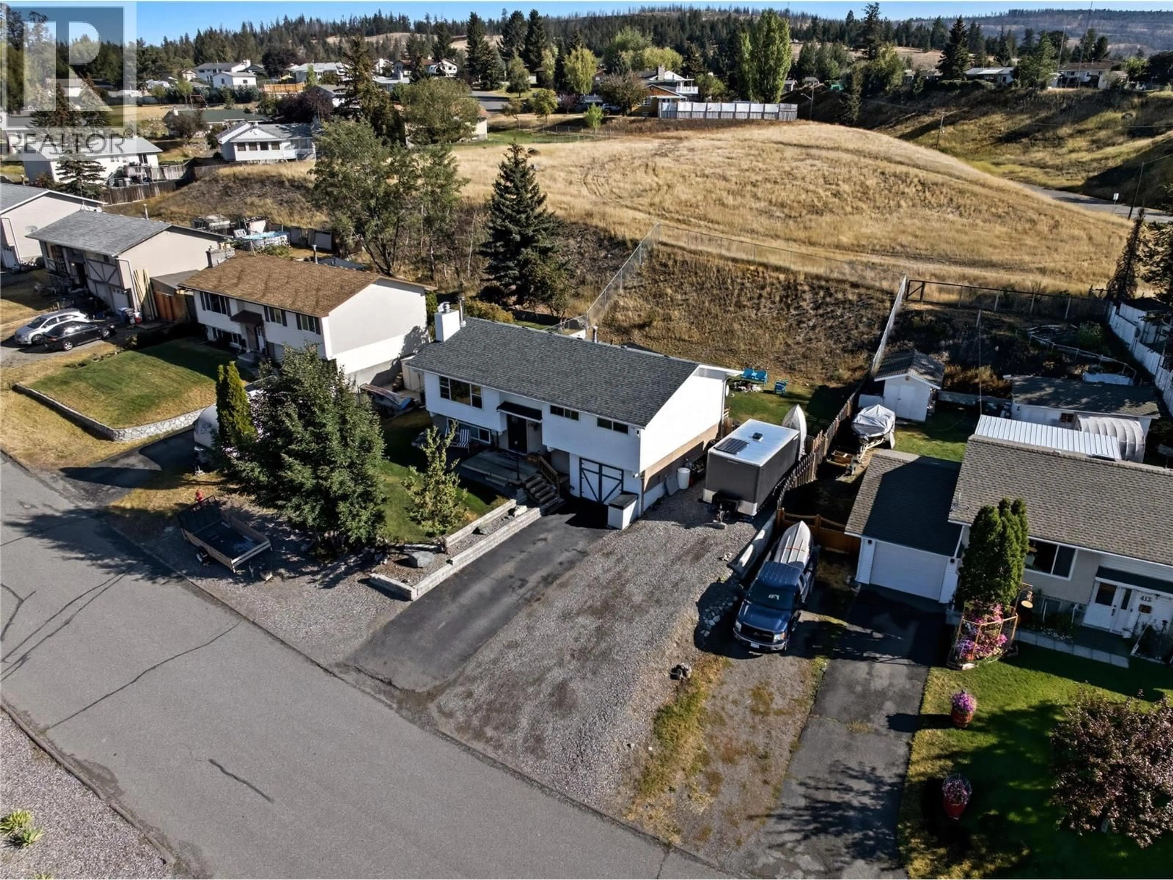 A pic from outside/outdoor area/front of a property/back of a property/a pic from drone, street for 415 OPAL DRIVE, Logan Lake British Columbia V0K1W0