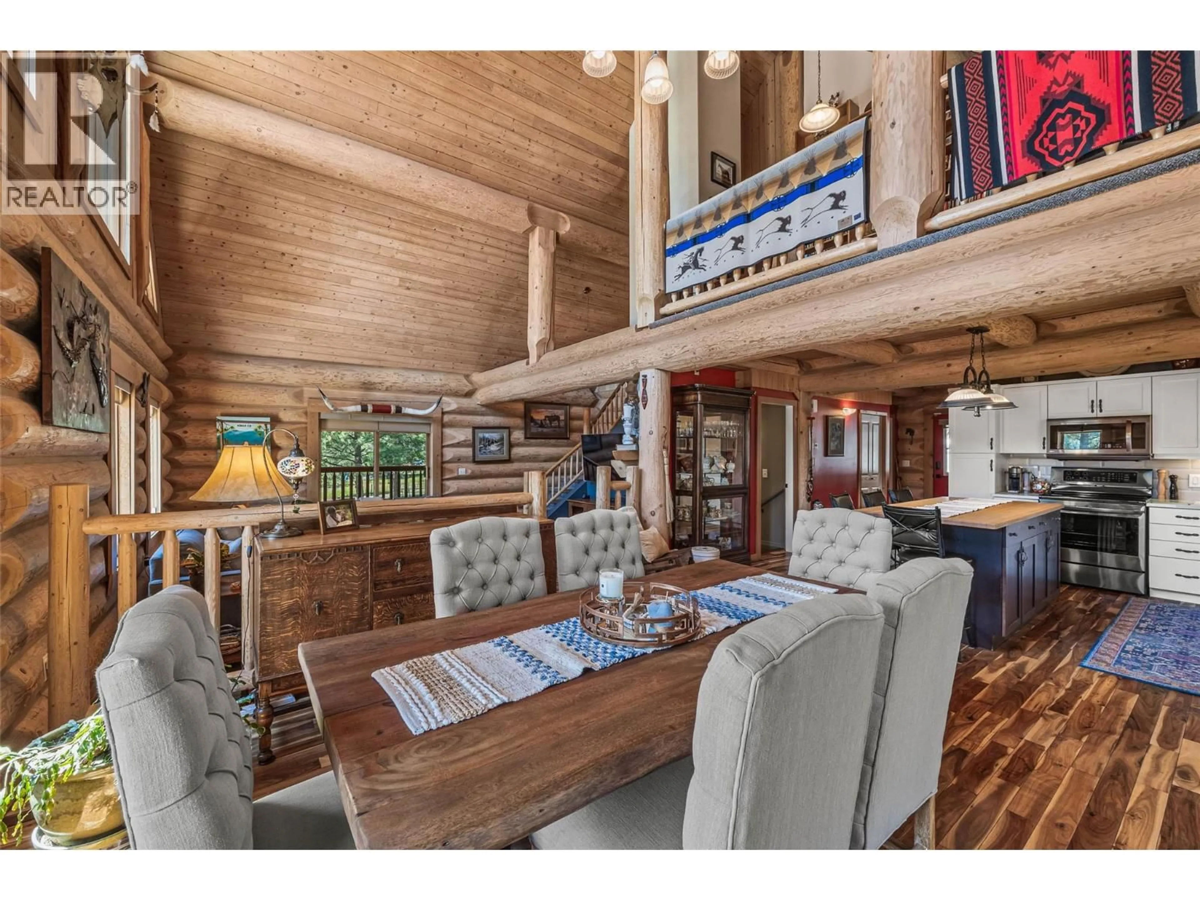 Open concept kitchen, wood/laminate floor for 1761 MILLER ROAD, Merritt British Columbia V1K1R8