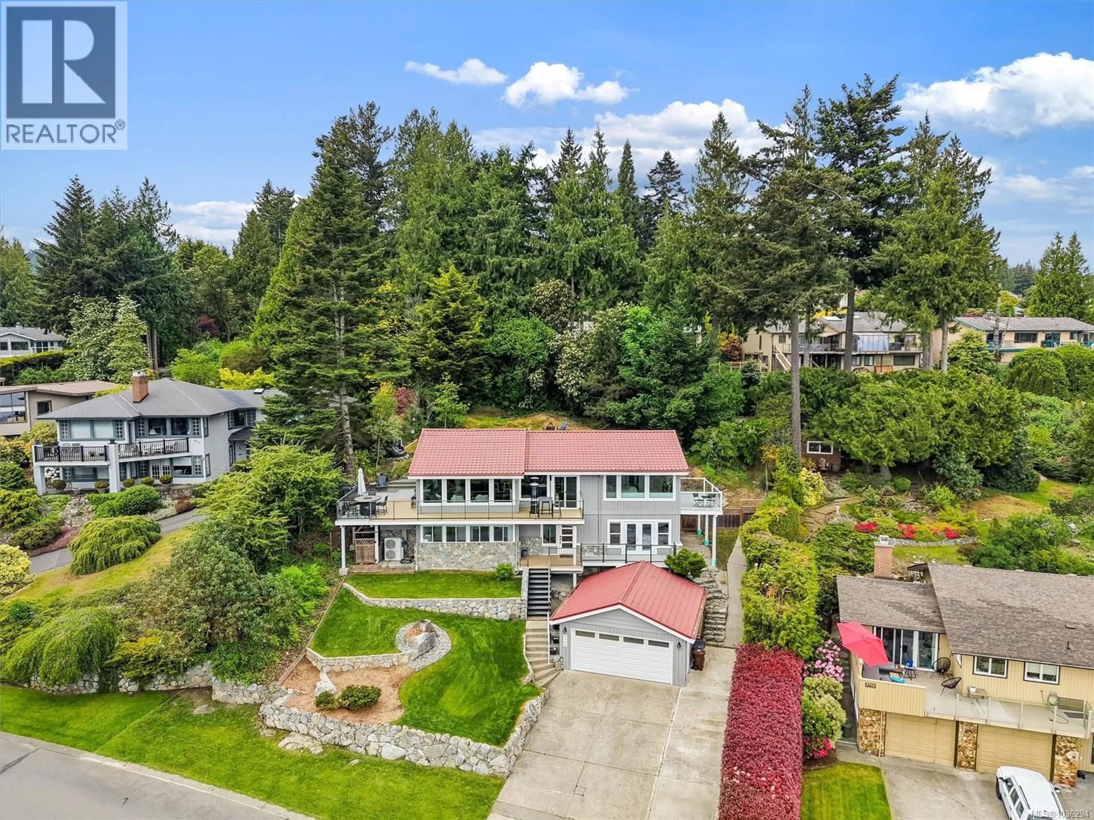 A pic from outside/outdoor area/front of a property/back of a property/a pic from drone, water/lake/river/ocean view for 8750 PENDER PARK DRIVE, North Saanich British Columbia V8L3Z5