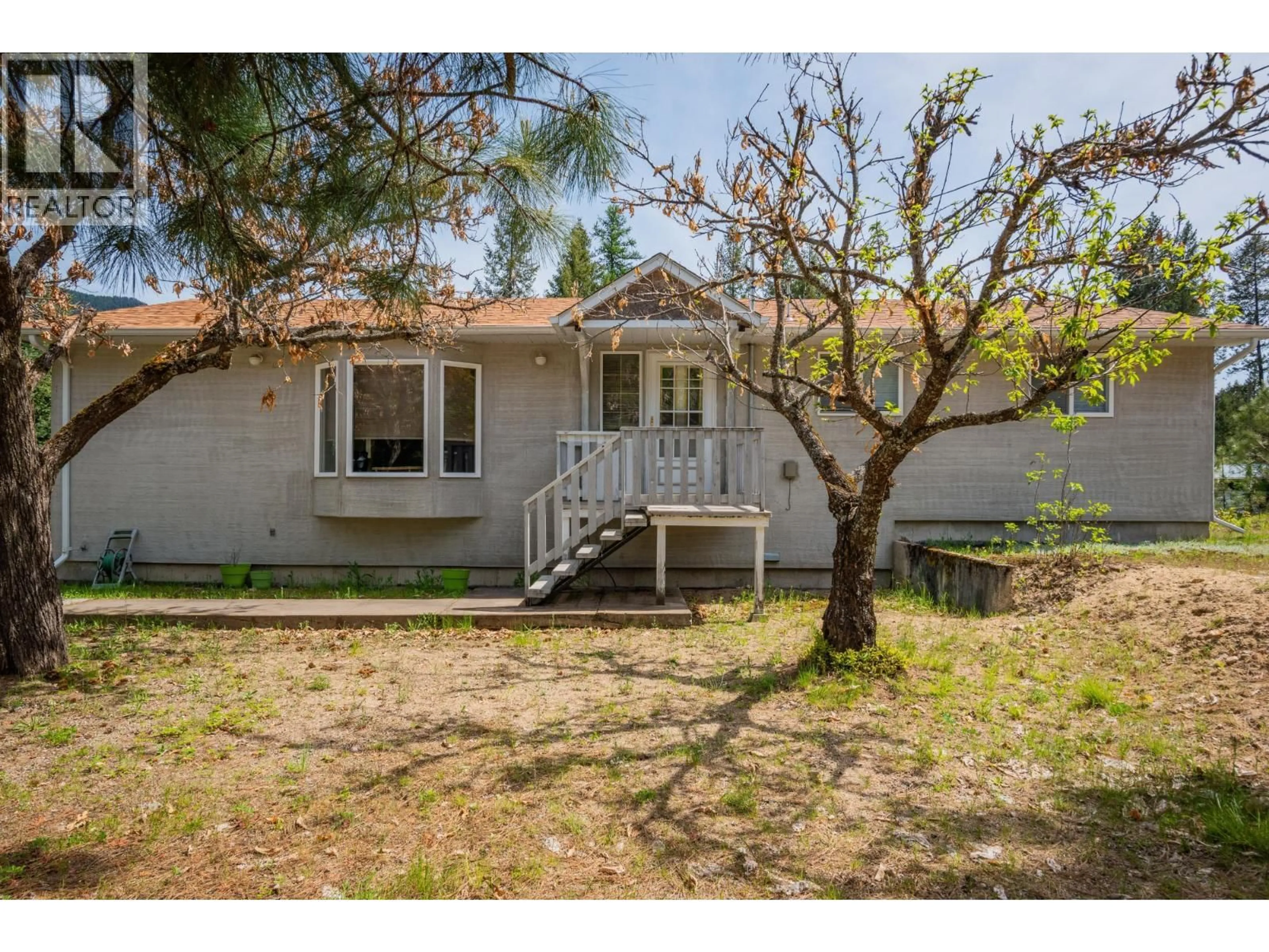 A pic from outside/outdoor area/front of a property/back of a property/a pic from drone, street for 60 CHASE ROAD, Christina Lake British Columbia V0G1E0