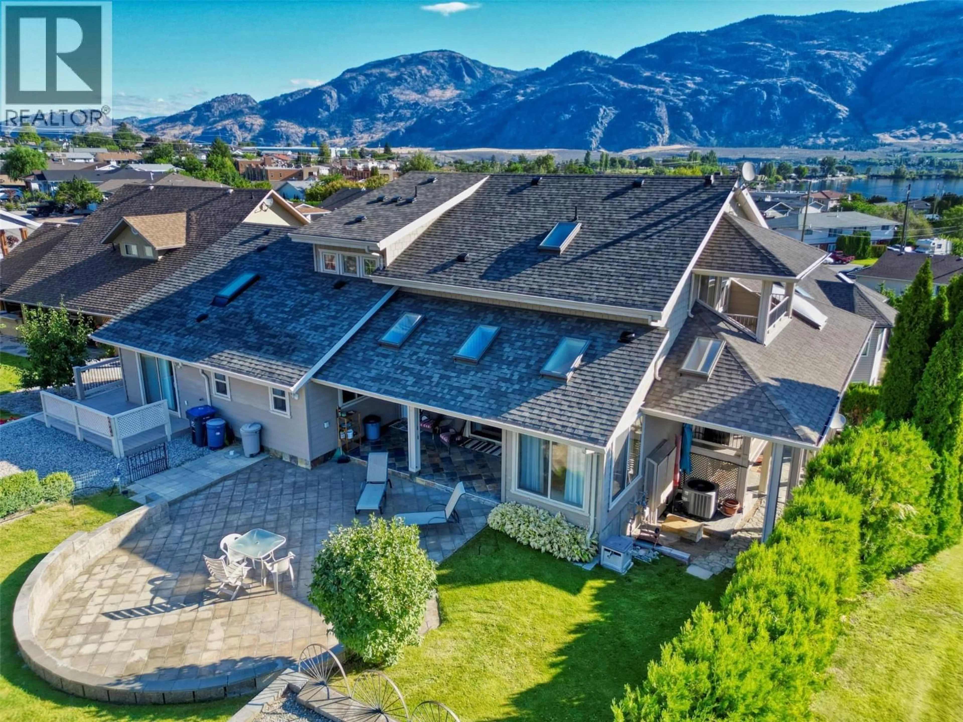 A pic from outside/outdoor area/front of a property/back of a property/a pic from drone, mountain view for 44 CACTUS CRESCENT, Osoyoos British Columbia V0H1V1