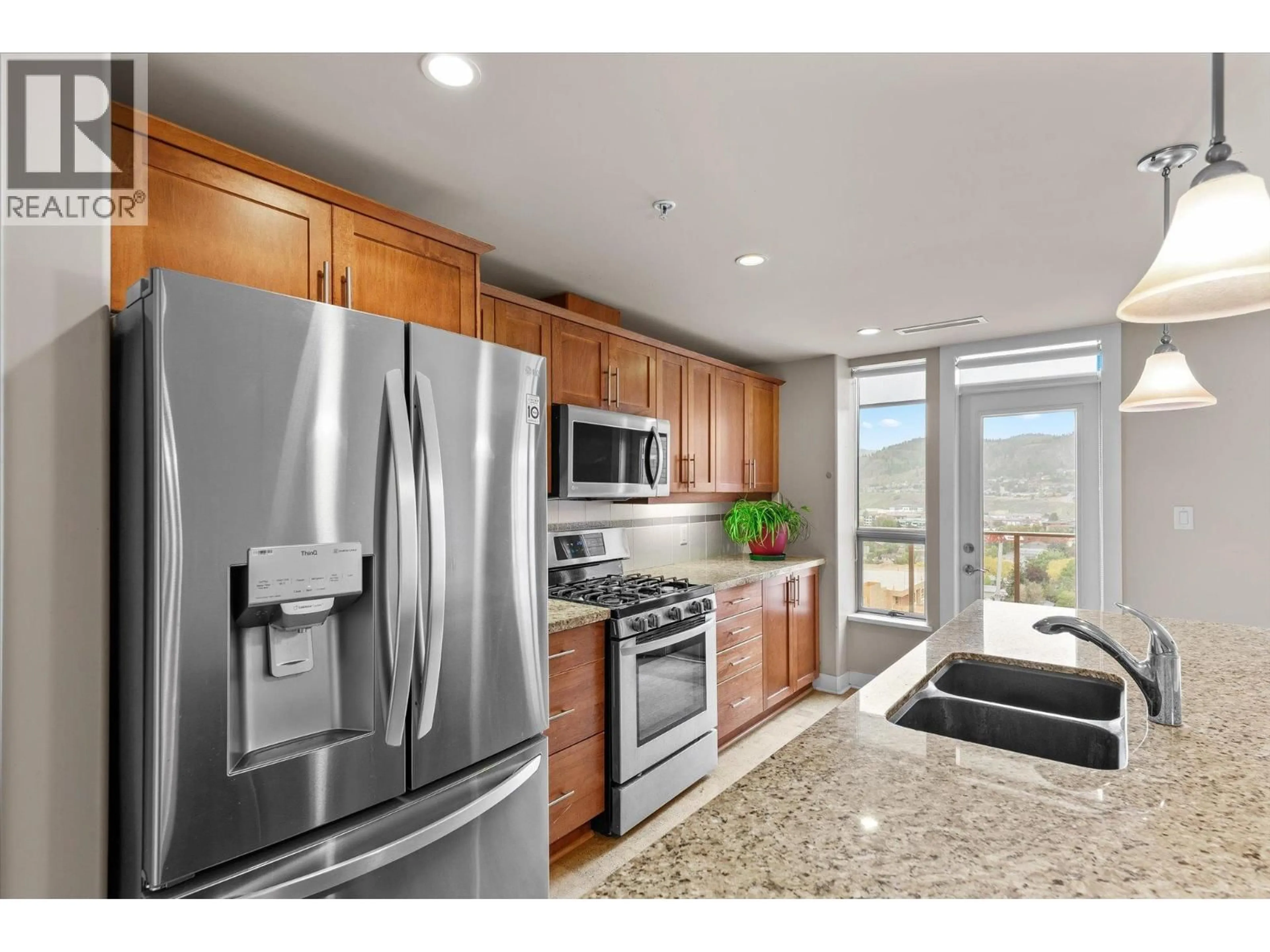 Open concept kitchen, ceramic/tile floor for 1207 - 1160 BERNARD AVENUE, Kelowna British Columbia V1Y6R2