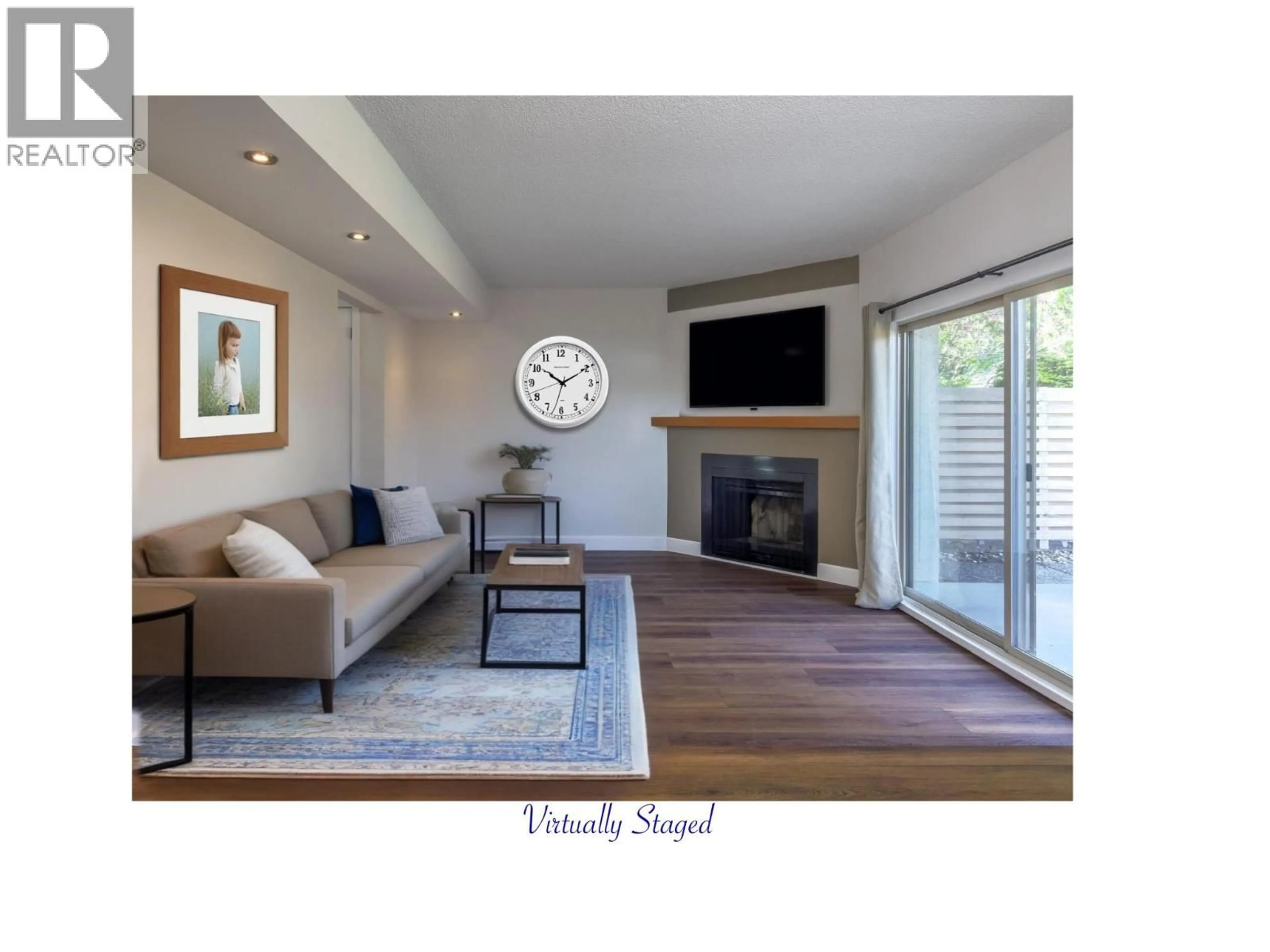 Living room with furniture, wood/laminate floor for 1 - 310 YORKTON AVENUE, Penticton British Columbia V2A6Z8