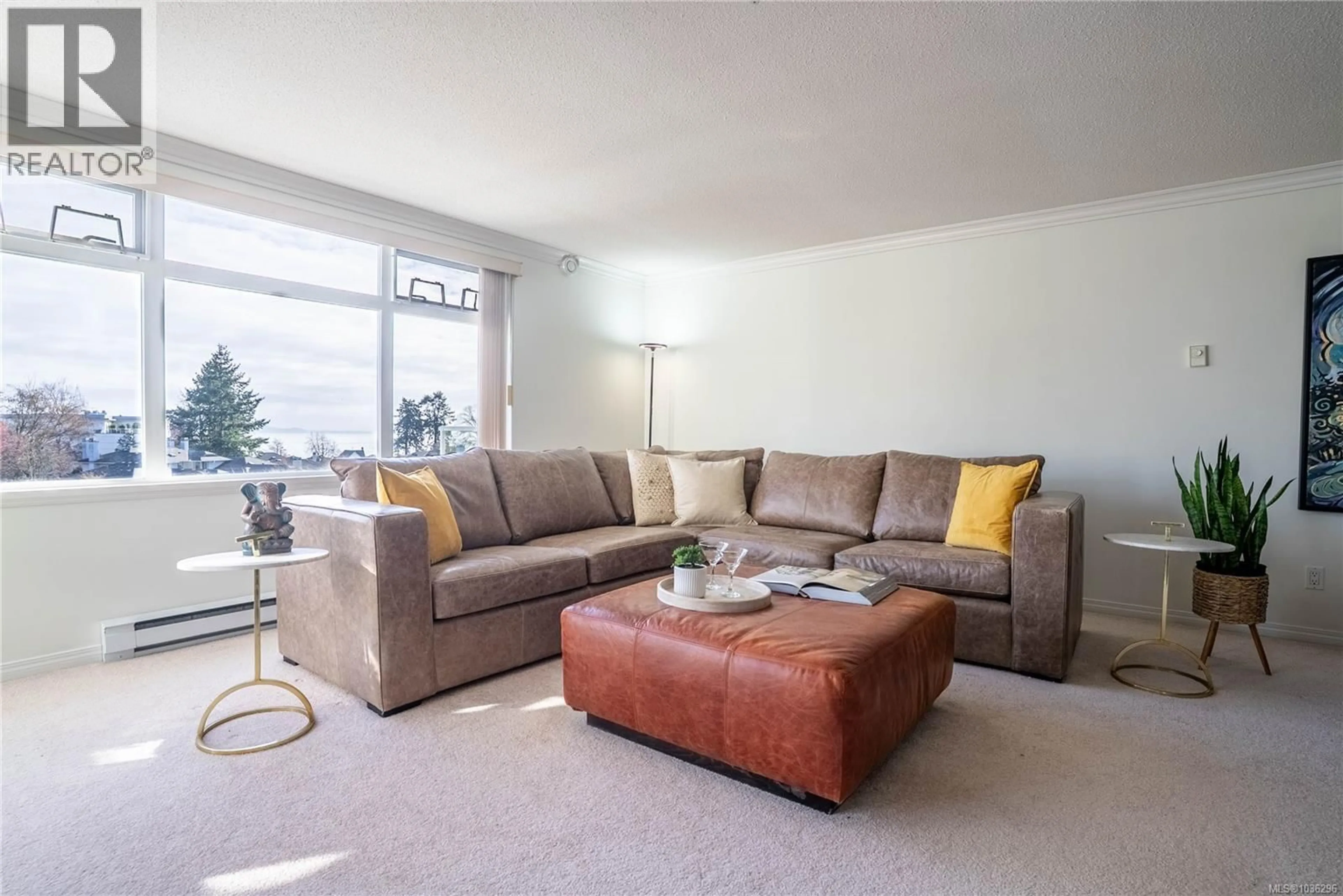Living room with furniture, unknown for 306 - 5110 CORDOVA BAY ROAD, Saanich British Columbia V8Y2K5
