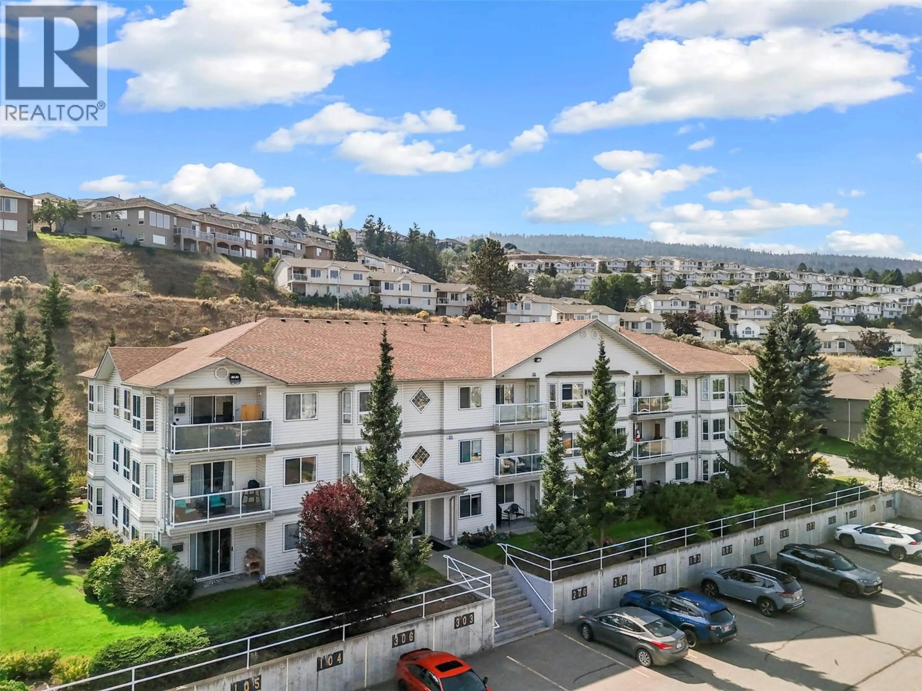 A pic from outside/outdoor area/front of a property/back of a property/a pic from drone, mountain view for 103 - 2025 PACIFIC WAY, Kamloops British Columbia V1S1V2