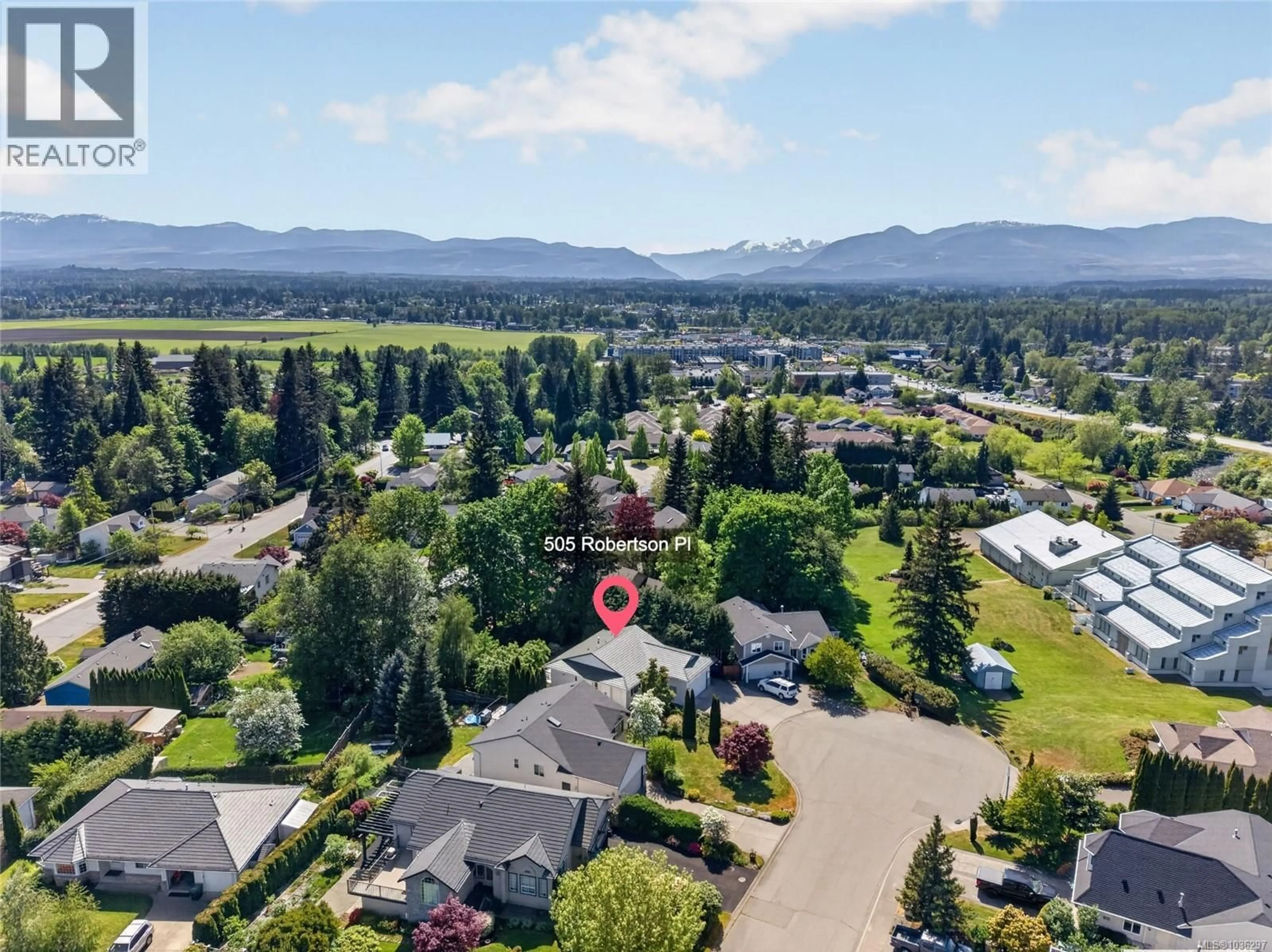 A pic from outside/outdoor area/front of a property/back of a property/a pic from drone, mountain view for 505 ROBERTSON PLACE, Courtenay British Columbia V9N8W5