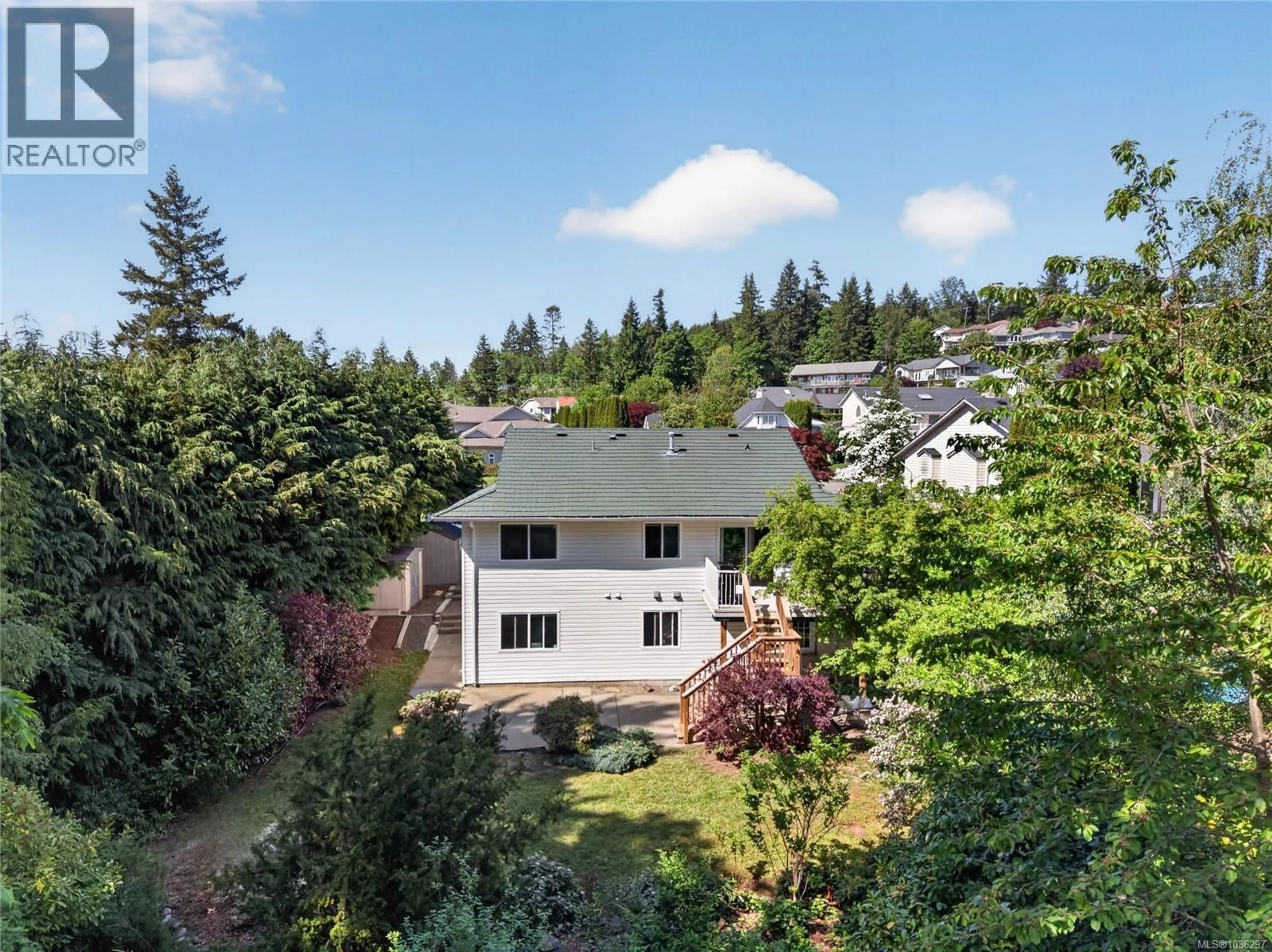 A pic from outside/outdoor area/front of a property/back of a property/a pic from drone, forest/trees view for 505 ROBERTSON PLACE, Courtenay British Columbia V9N8W5
