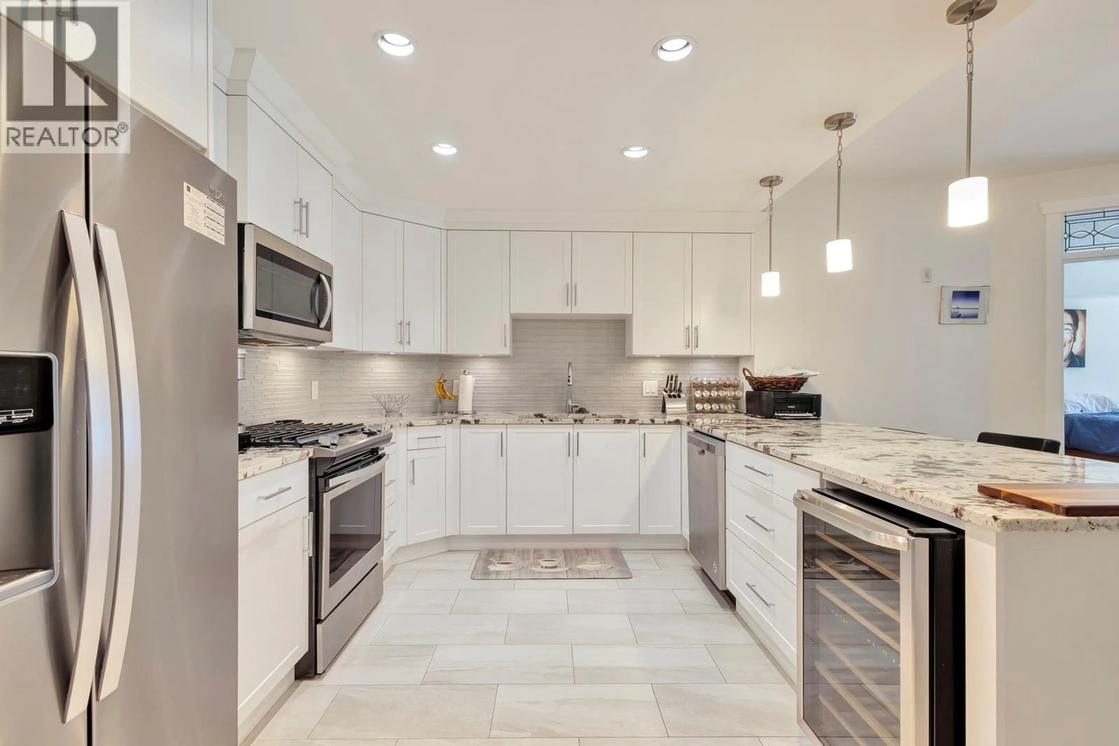 Contemporary kitchen, ceramic/tile floor for 305 - 3865 TRUSWELL ROAD, Kelowna British Columbia V1W3K9