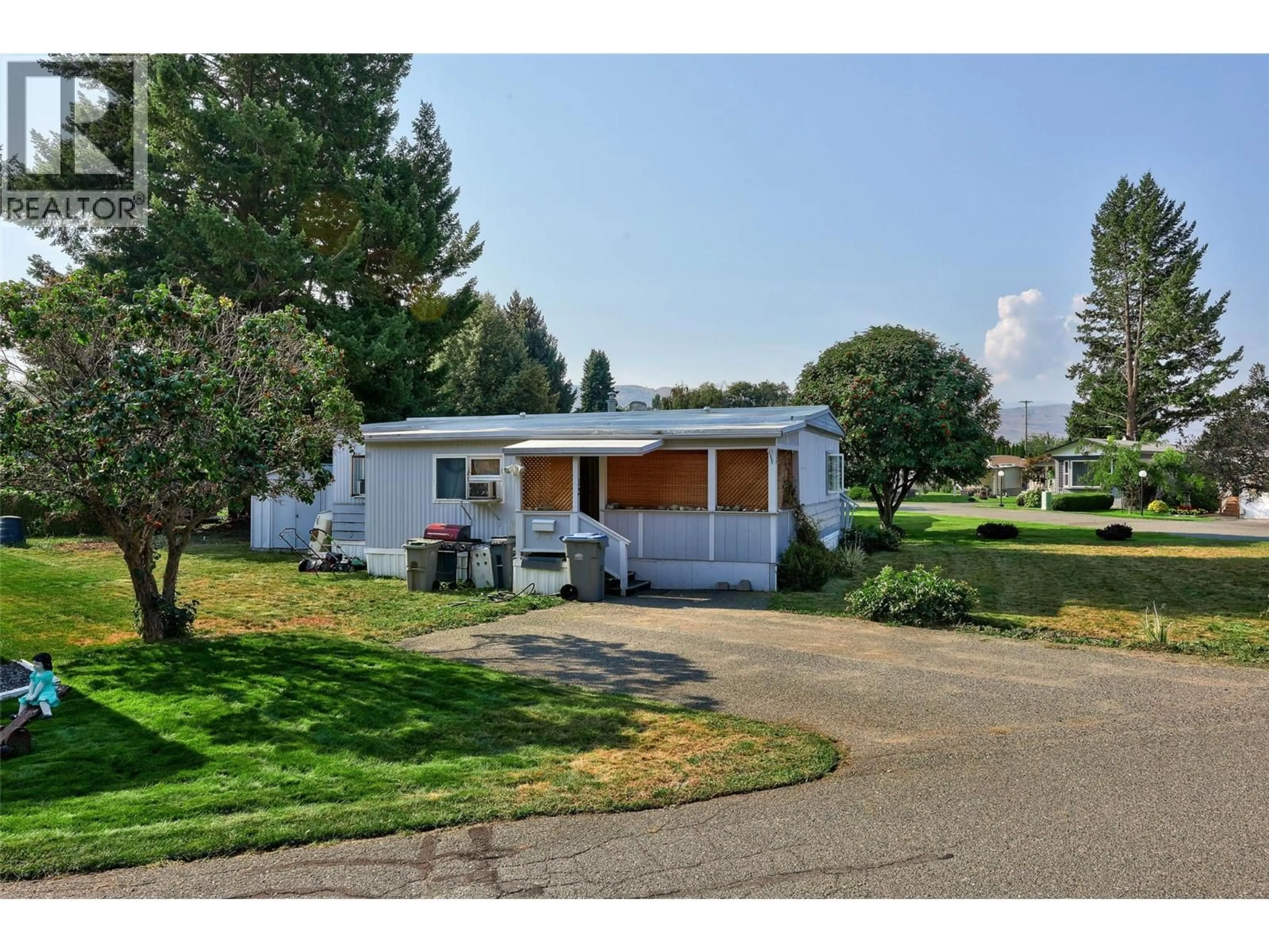 Home with vinyl exterior material, street for 12 - 2401 ORD ROAD, Kamloops British Columbia V2B7V8