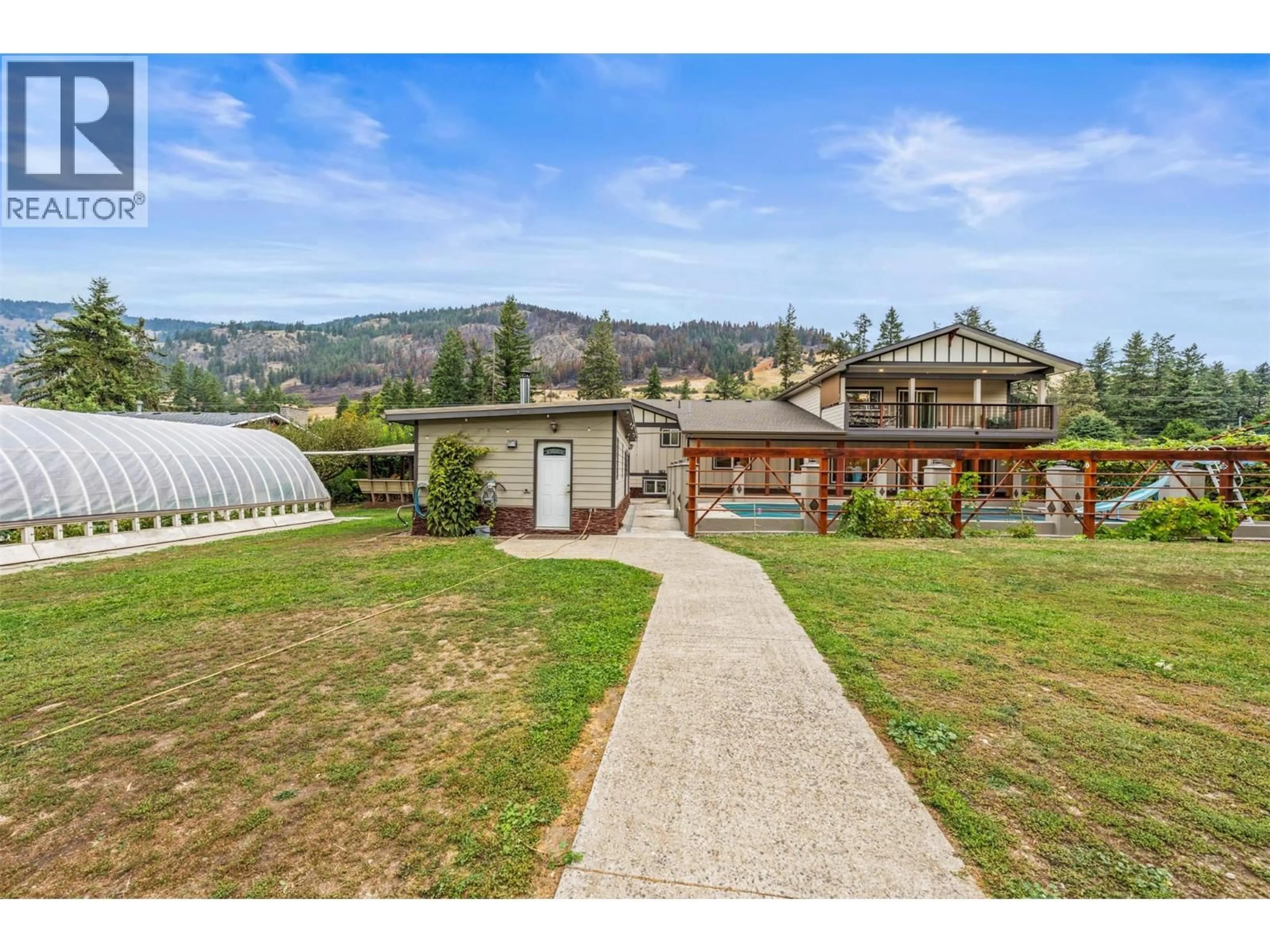 A pic from outside/outdoor area/front of a property/back of a property/a pic from drone, mountain view for 5936 HIGHWAY 6 OTHER, Coldstream British Columbia V1B1C8