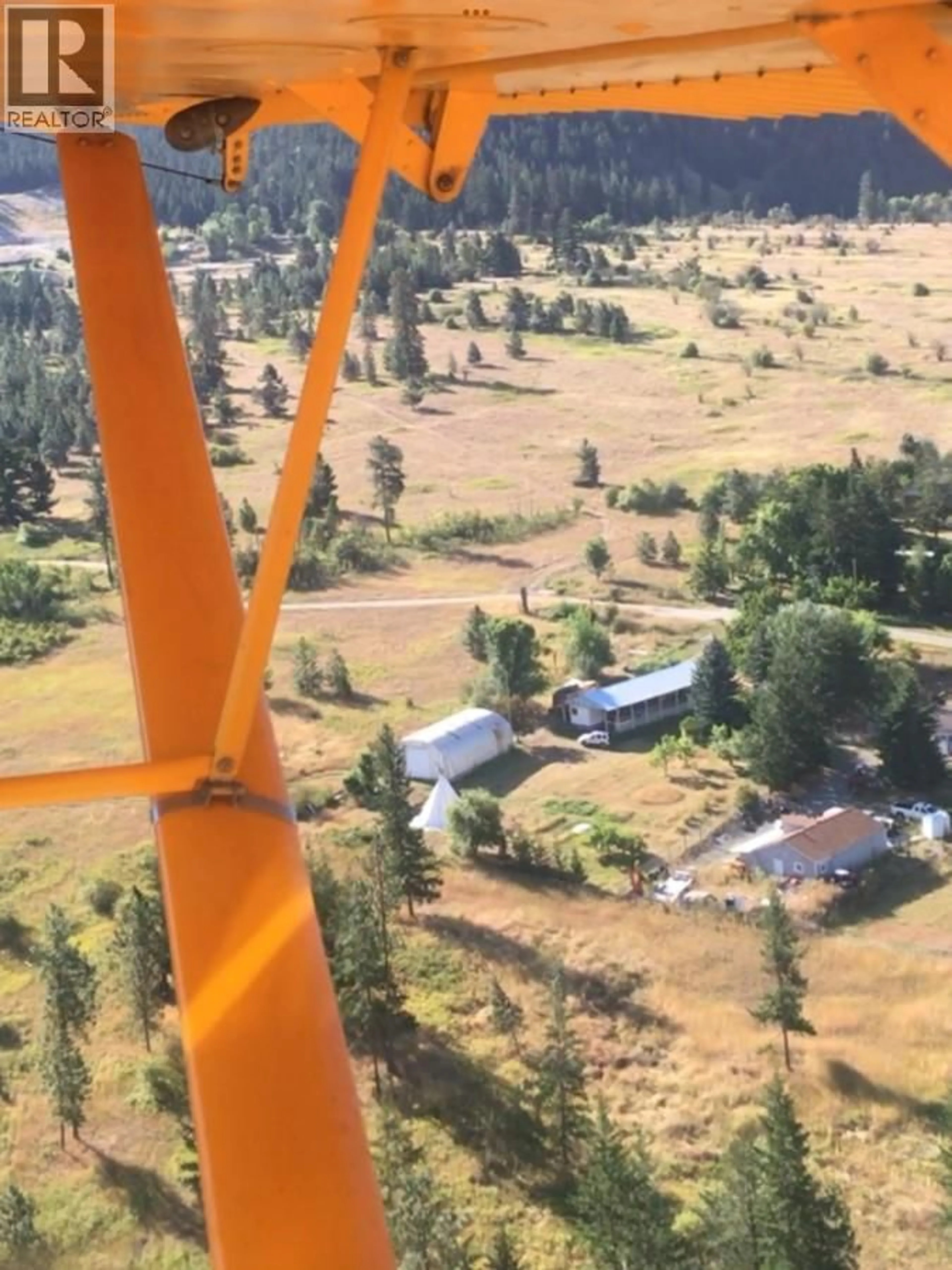 A pic from outside/outdoor area/front of a property/back of a property/a pic from drone, mountain view for 4893 POPLAR ROAD, Kamloops British Columbia V0E2P0