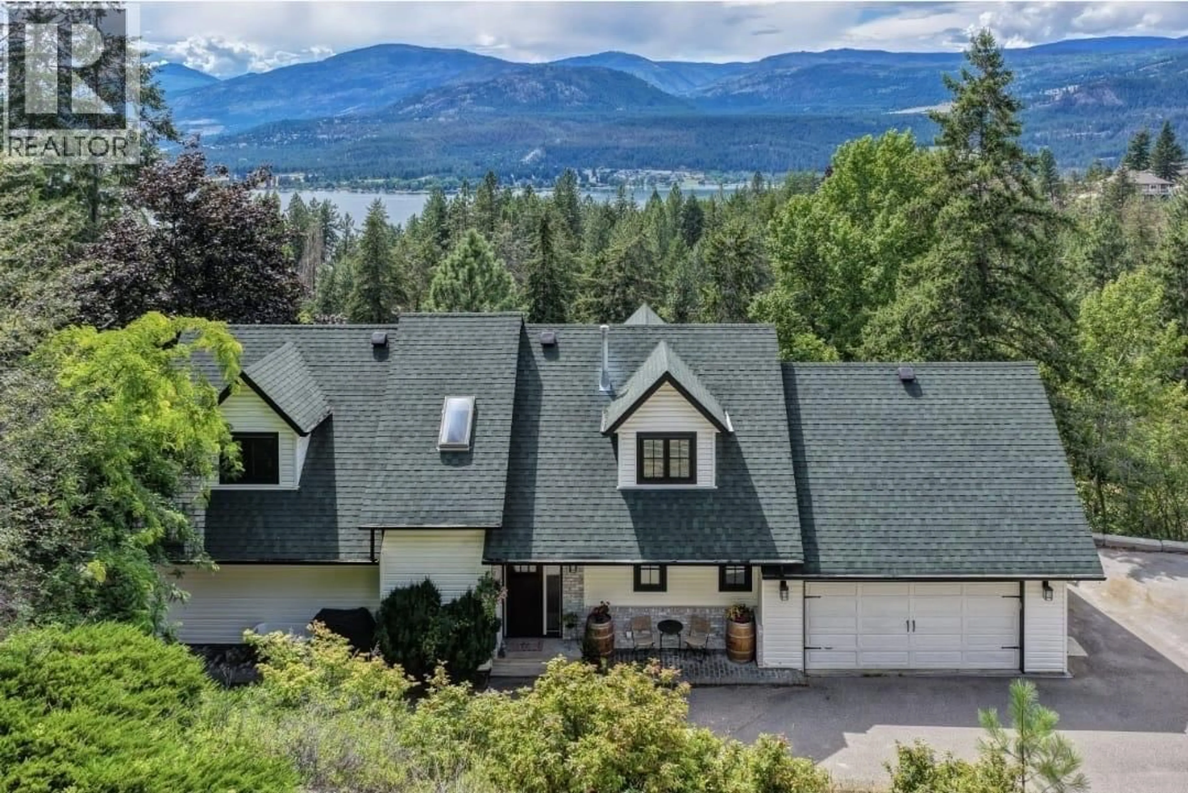 A pic from outside/outdoor area/front of a property/back of a property/a pic from drone, mountain view for 133 GOLDCLAIM ROAD, Vernon British Columbia V1H1H2