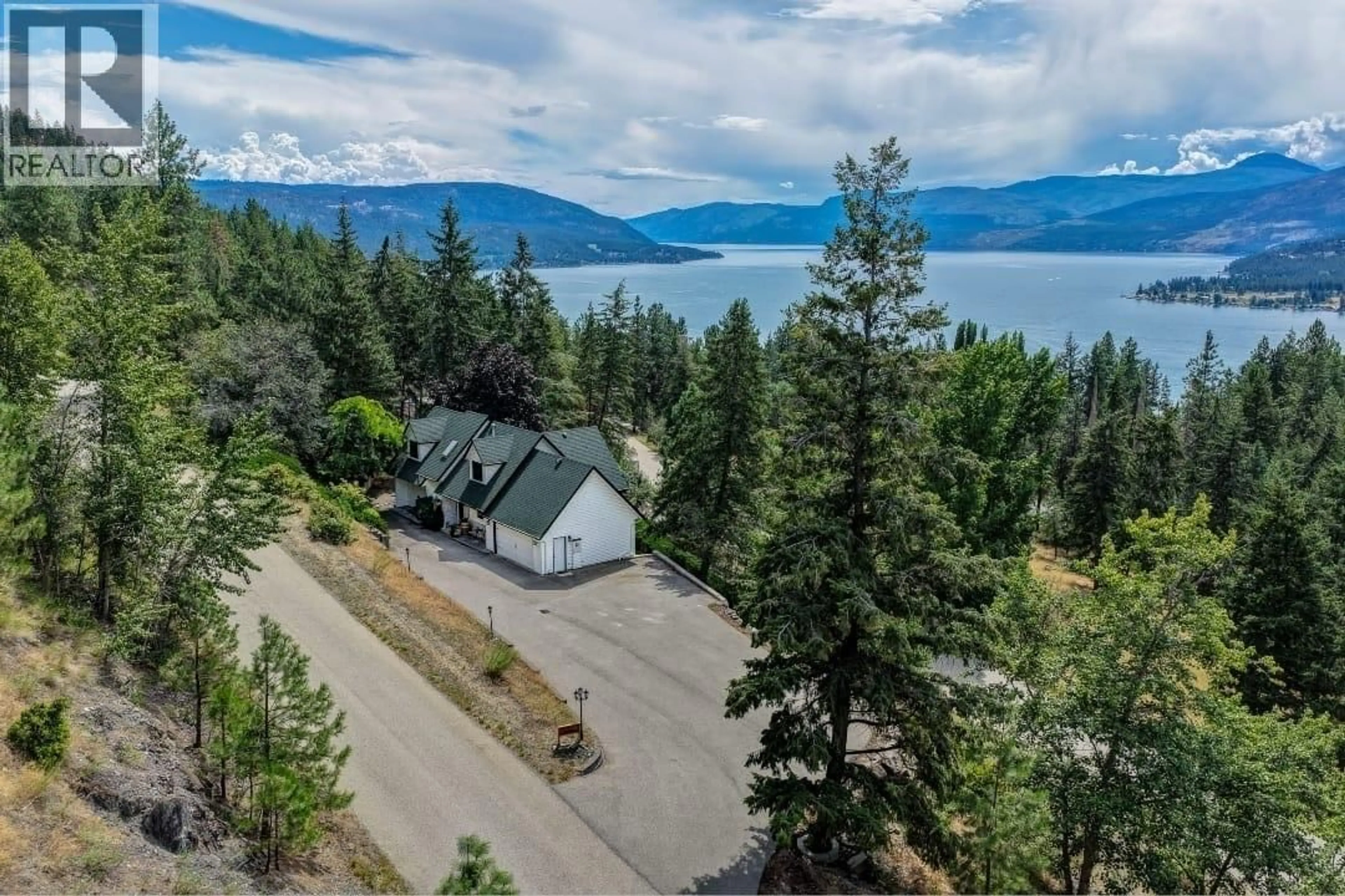 A pic from outside/outdoor area/front of a property/back of a property/a pic from drone, water/lake/river/ocean view for 133 GOLDCLAIM ROAD, Vernon British Columbia V1H1H2