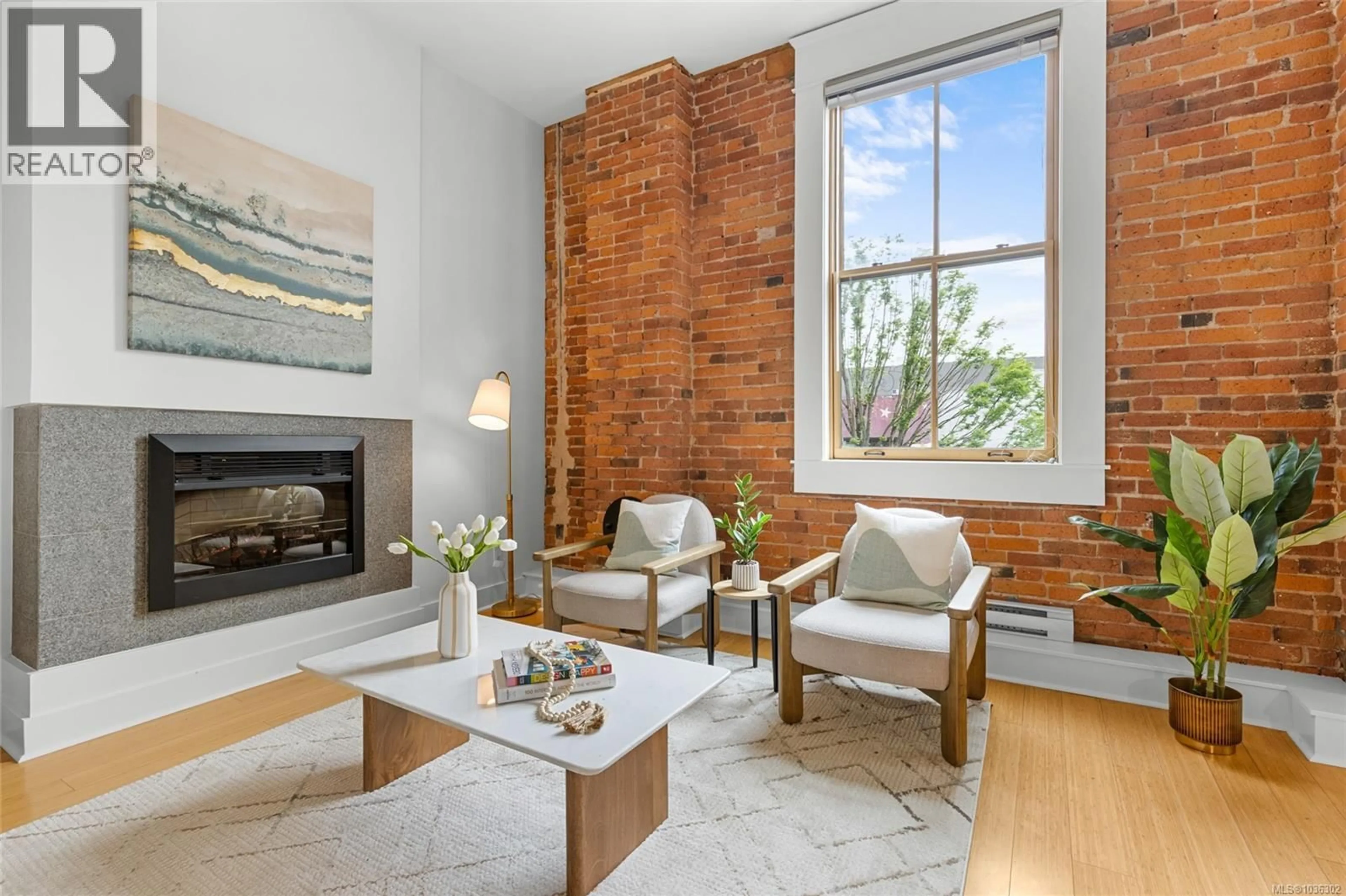 Living room with furniture, unknown for 203 - 610 JOHNSON STREET, Victoria British Columbia V8W1M4