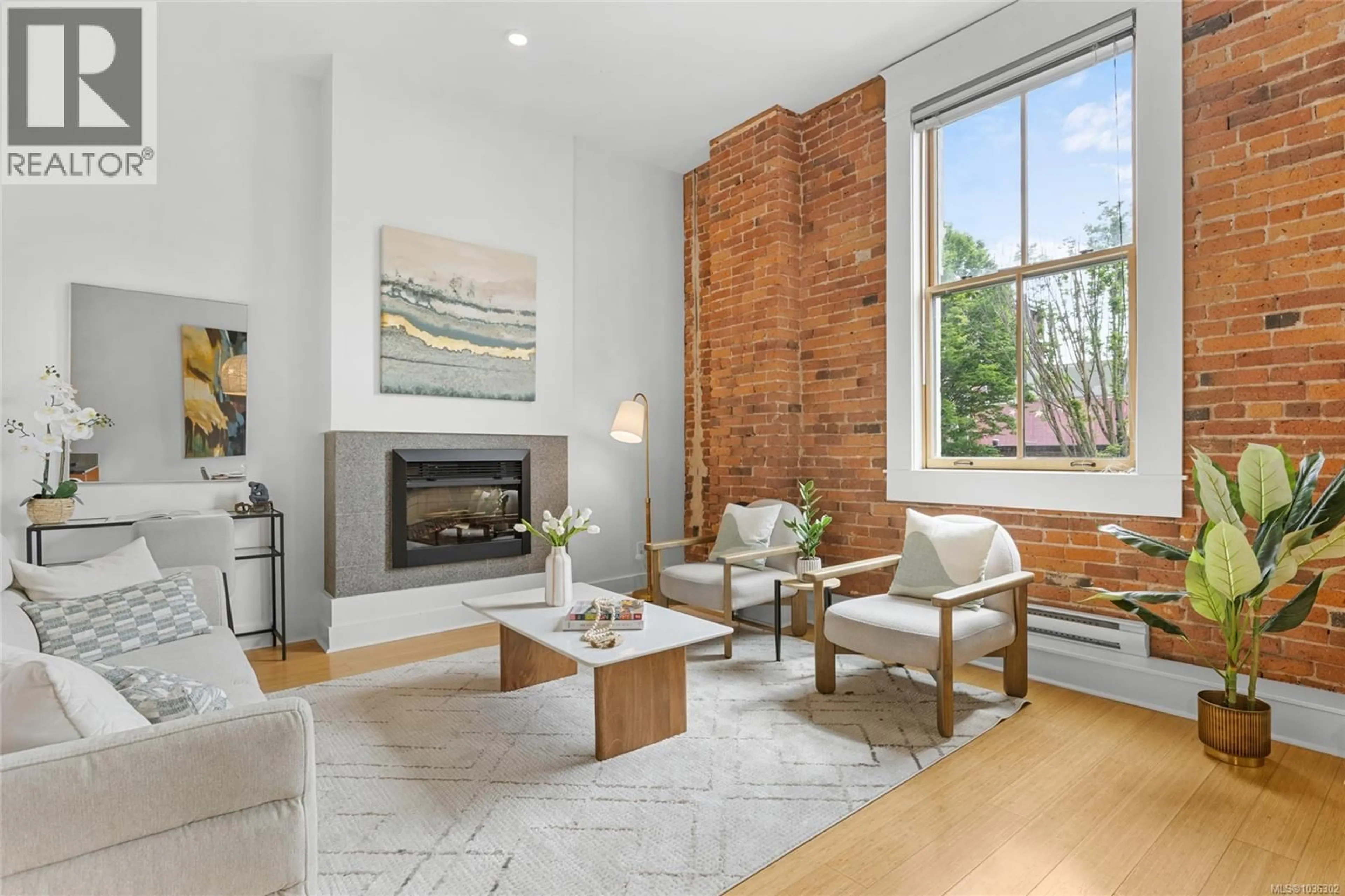 Living room with furniture, unknown for 203 - 610 JOHNSON STREET, Victoria British Columbia V8W1M4