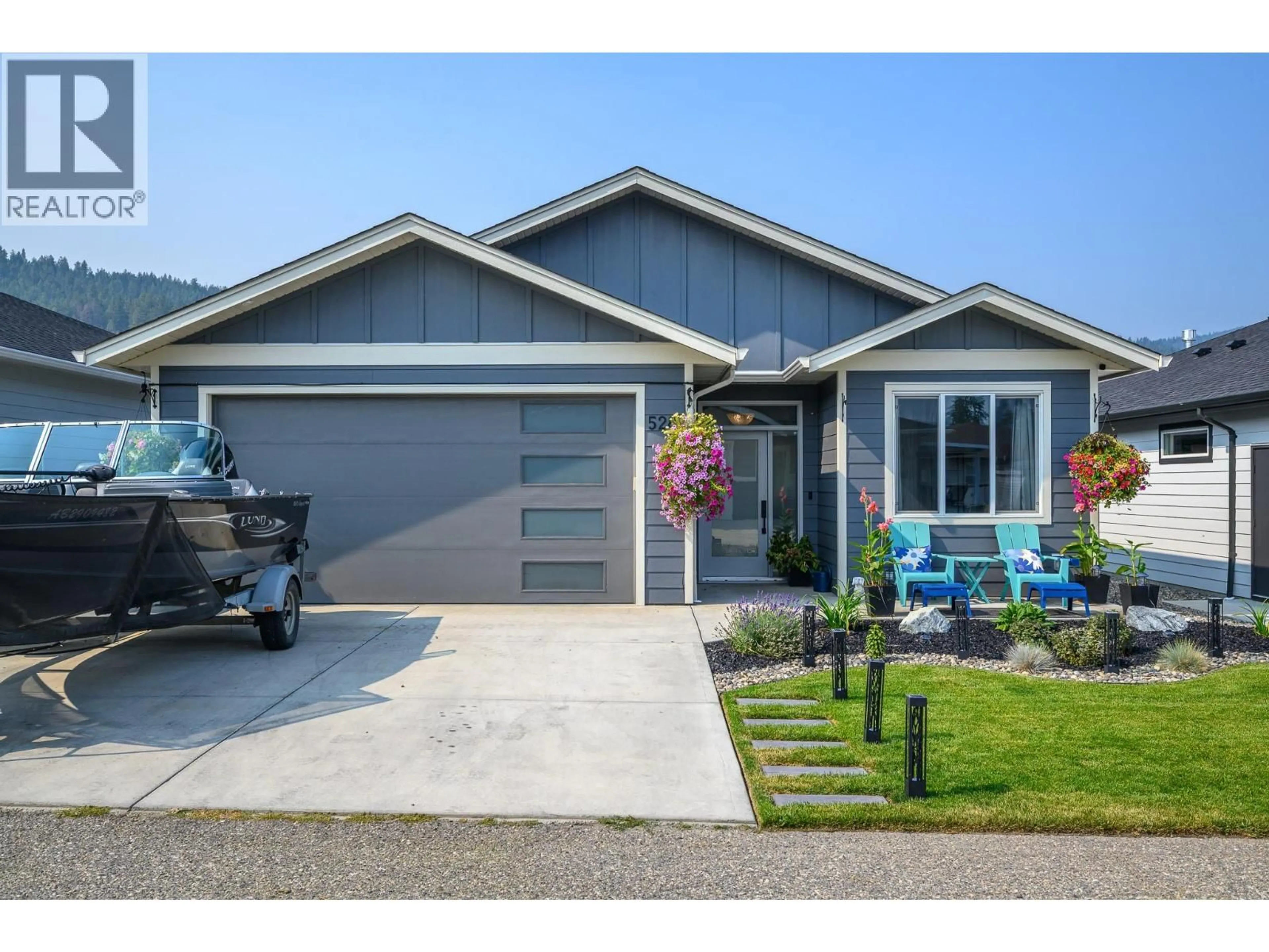 Home with vinyl exterior material, street for 528 LOON AVENUE, Vernon British Columbia V1H2A1