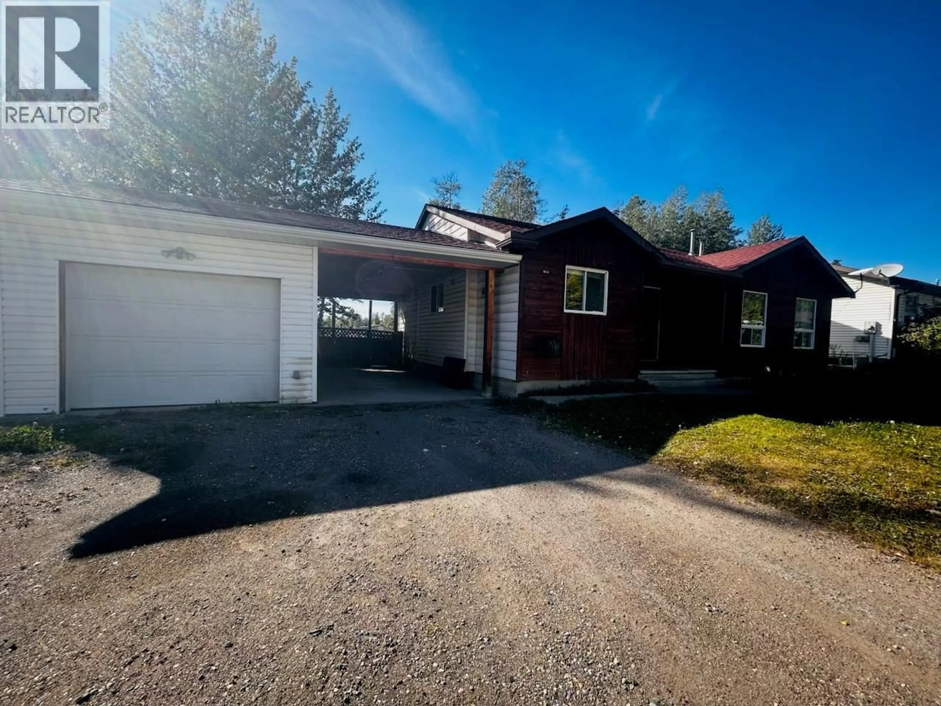 A pic from outside/outdoor area/front of a property/back of a property/a pic from drone, street for 211 GWILLIM CRESCENT, Tumbler Ridge British Columbia V0C2W0