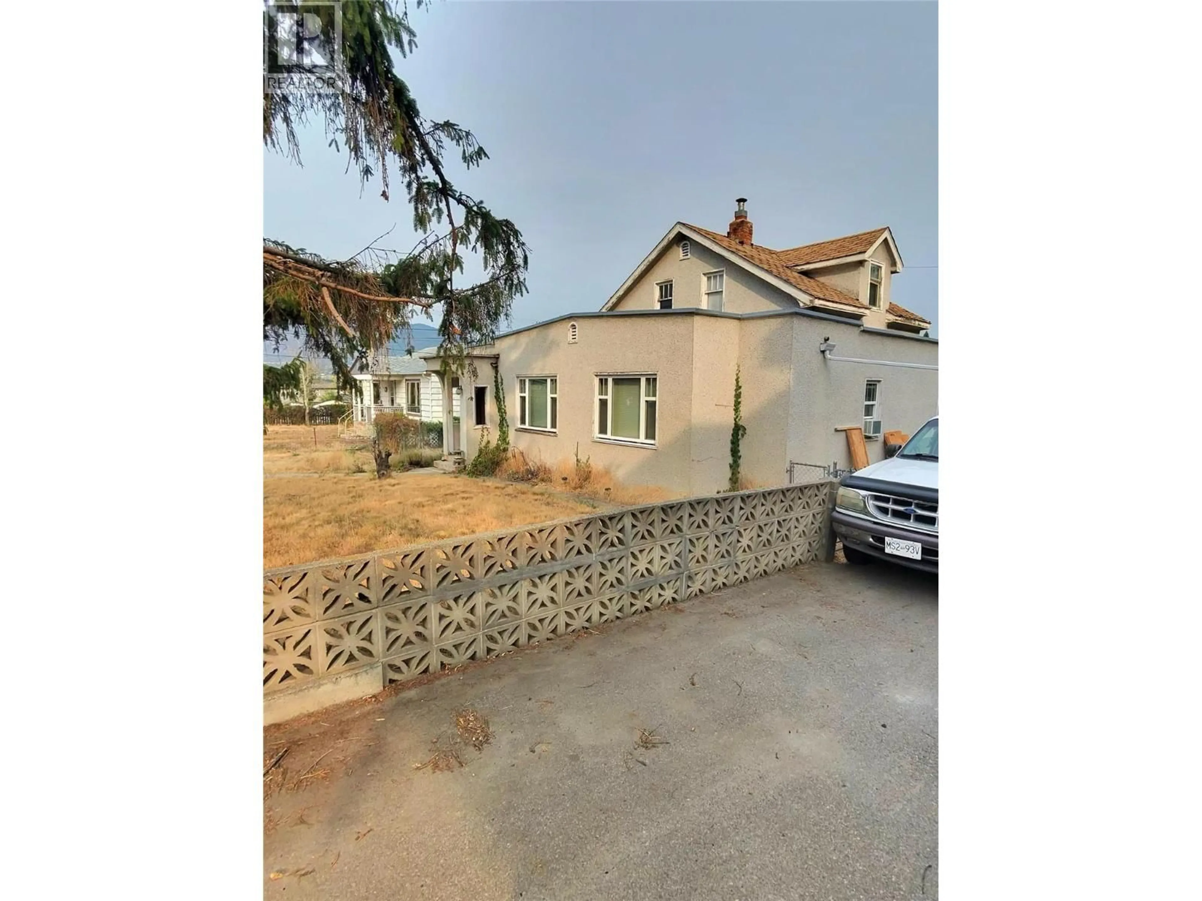 A pic from outside/outdoor area/front of a property/back of a property/a pic from drone, street for 421 WADE AVENUE EAST, Penticton British Columbia V2A1T1