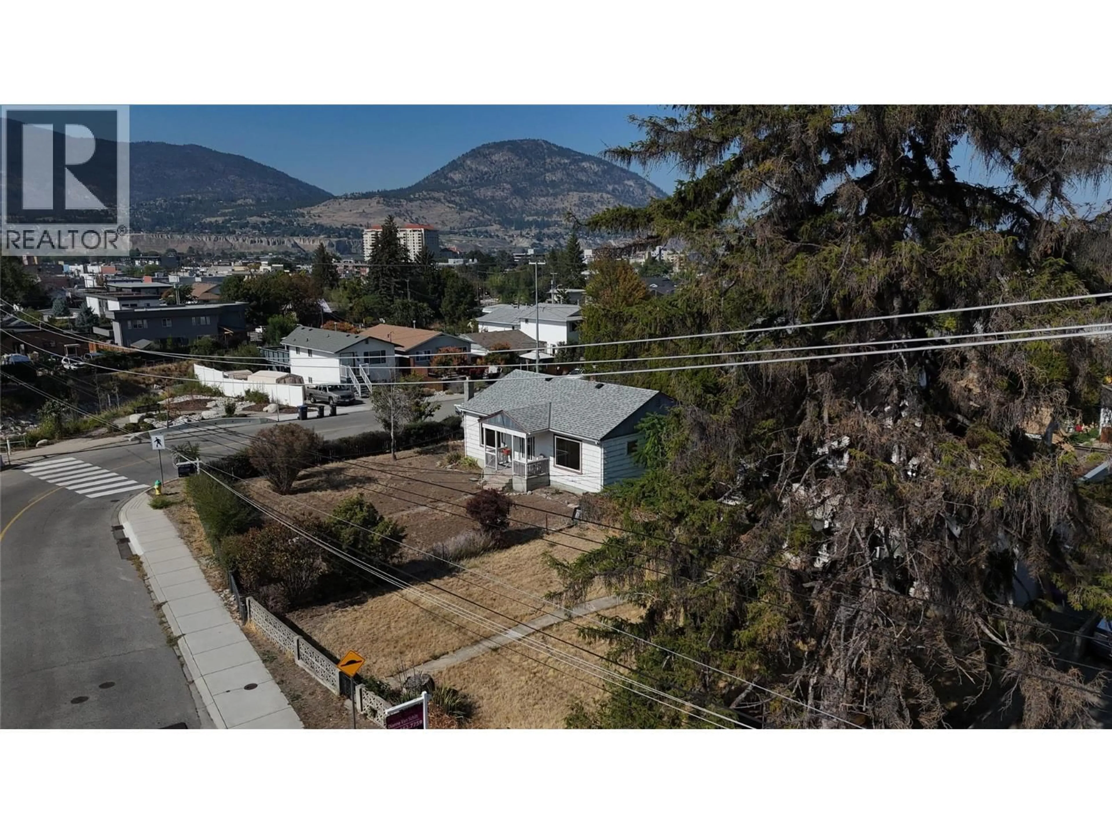 A pic from outside/outdoor area/front of a property/back of a property/a pic from drone, mountain view for 421 WADE AVENUE EAST, Penticton British Columbia V2A1T1