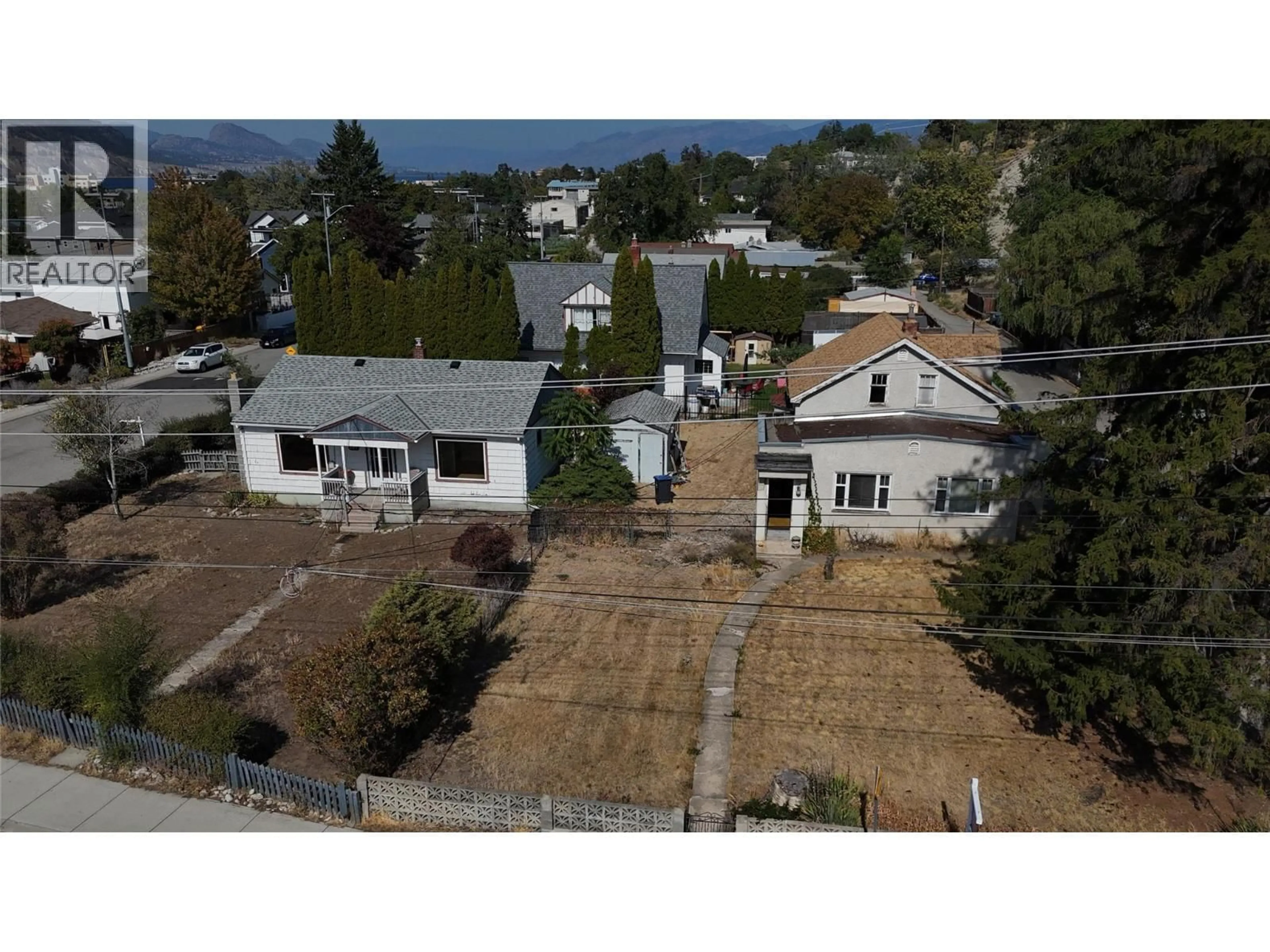 A pic from outside/outdoor area/front of a property/back of a property/a pic from drone, street for 421 WADE AVENUE EAST, Penticton British Columbia V2A1T1