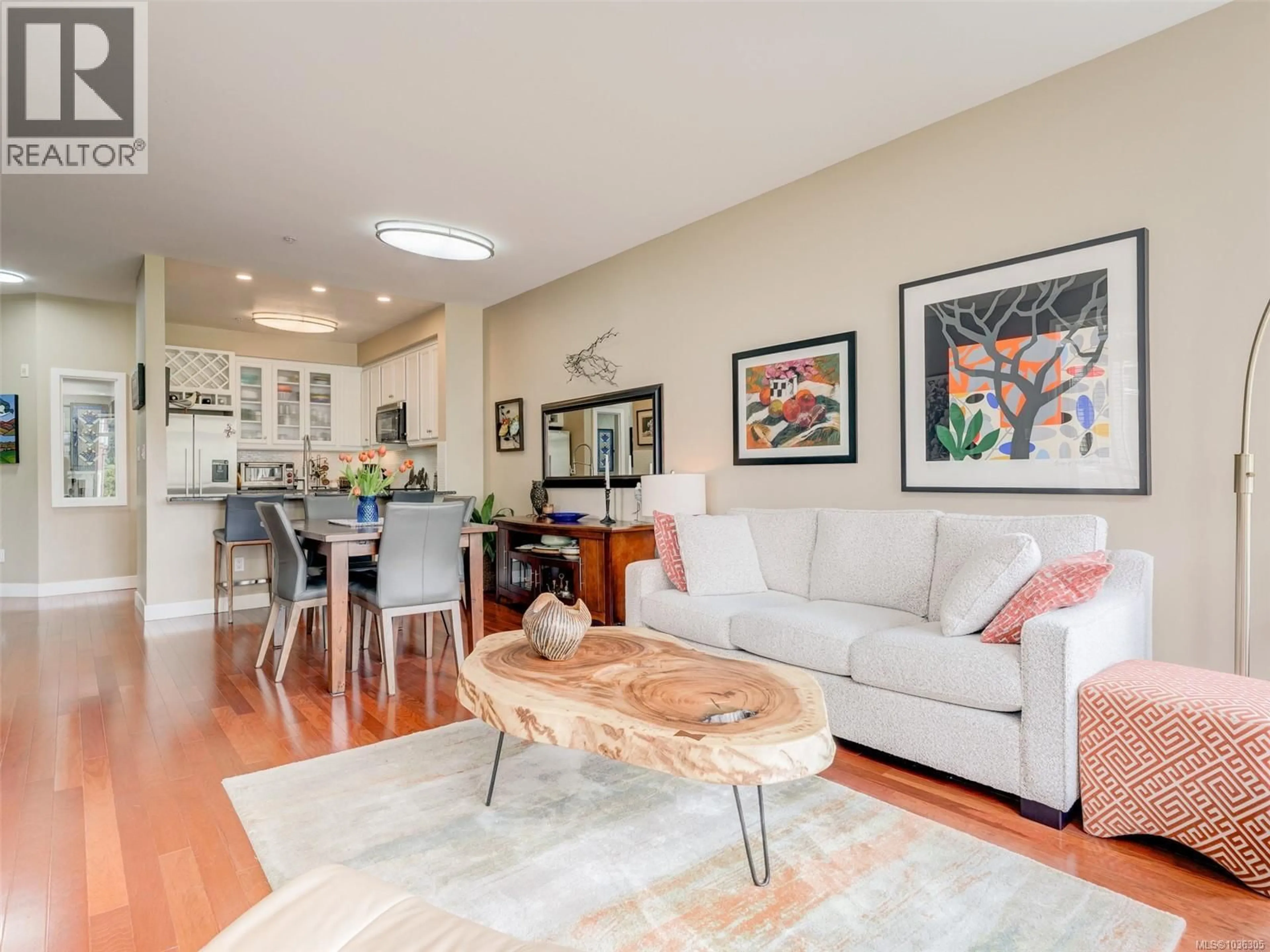 Living room with furniture, wood/laminate floor for 306D - 1115 CRAIGFLOWER ROAD, Esquimalt British Columbia V9A7R1