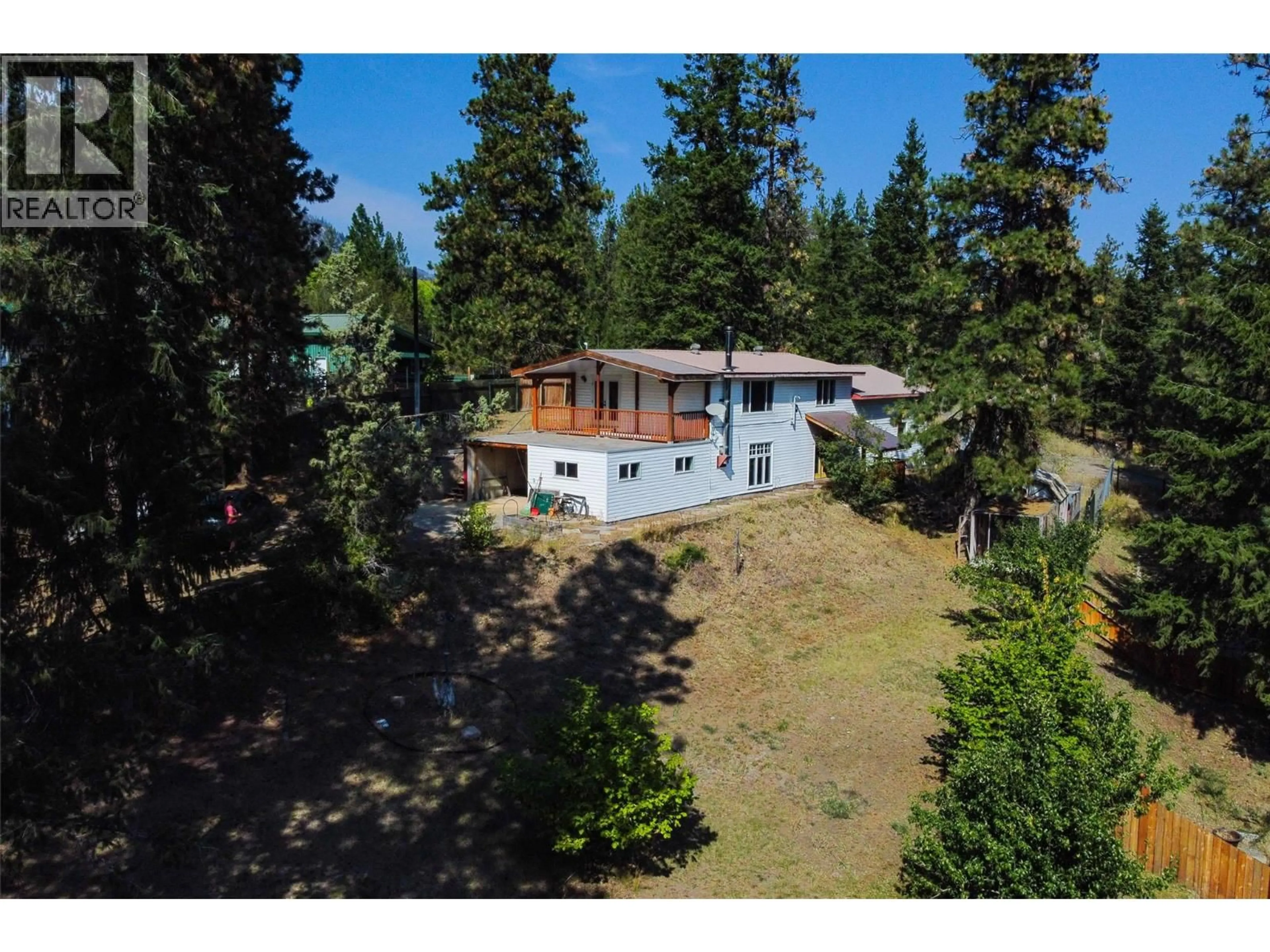 A pic from outside/outdoor area/front of a property/back of a property/a pic from drone, unknown for 820 FIRWOOD ROAD, Kelowna British Columbia V1Z3V5