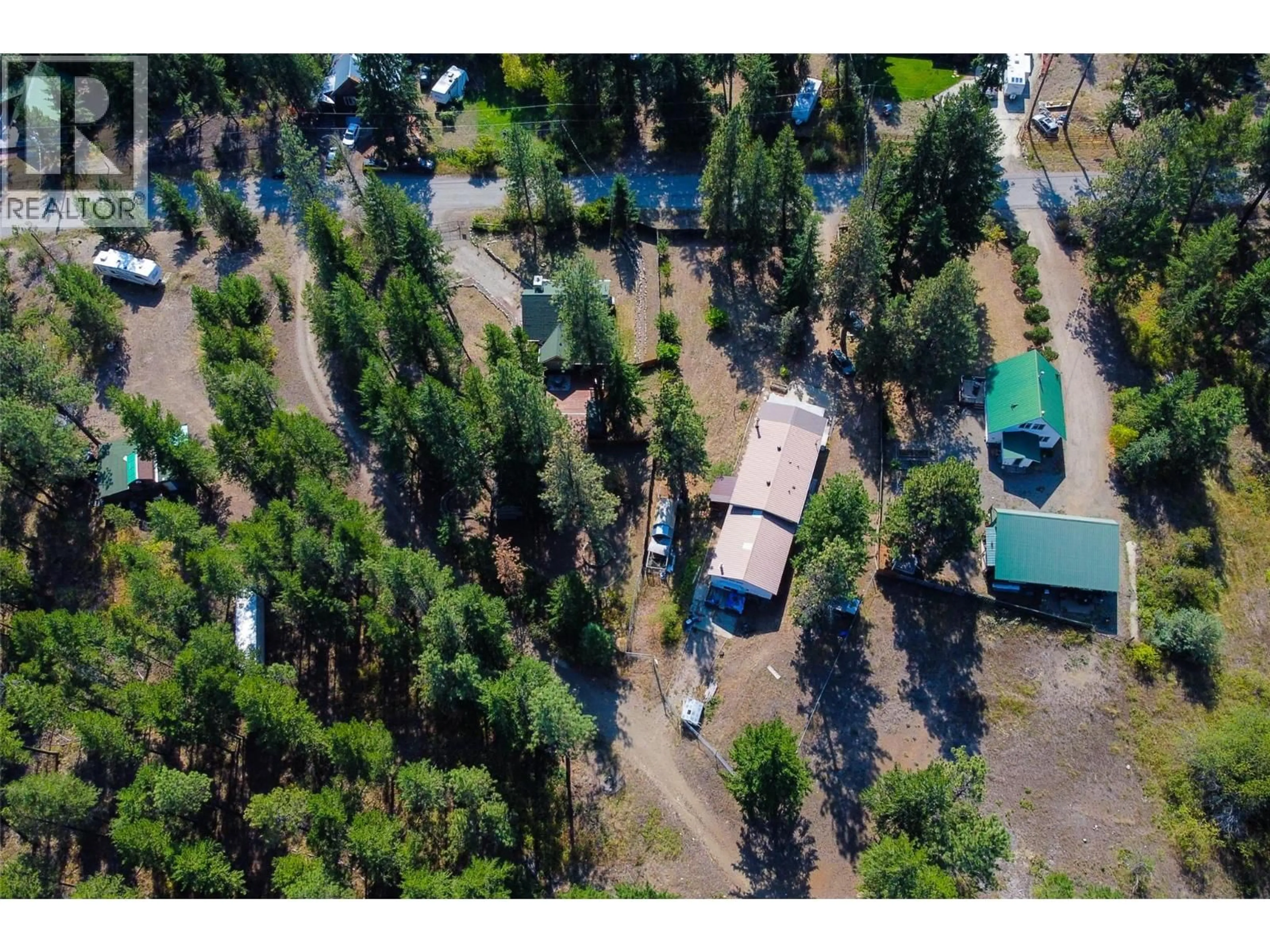 A pic from outside/outdoor area/front of a property/back of a property/a pic from drone, forest/trees view for 820 FIRWOOD ROAD, Kelowna British Columbia V1Z3V5