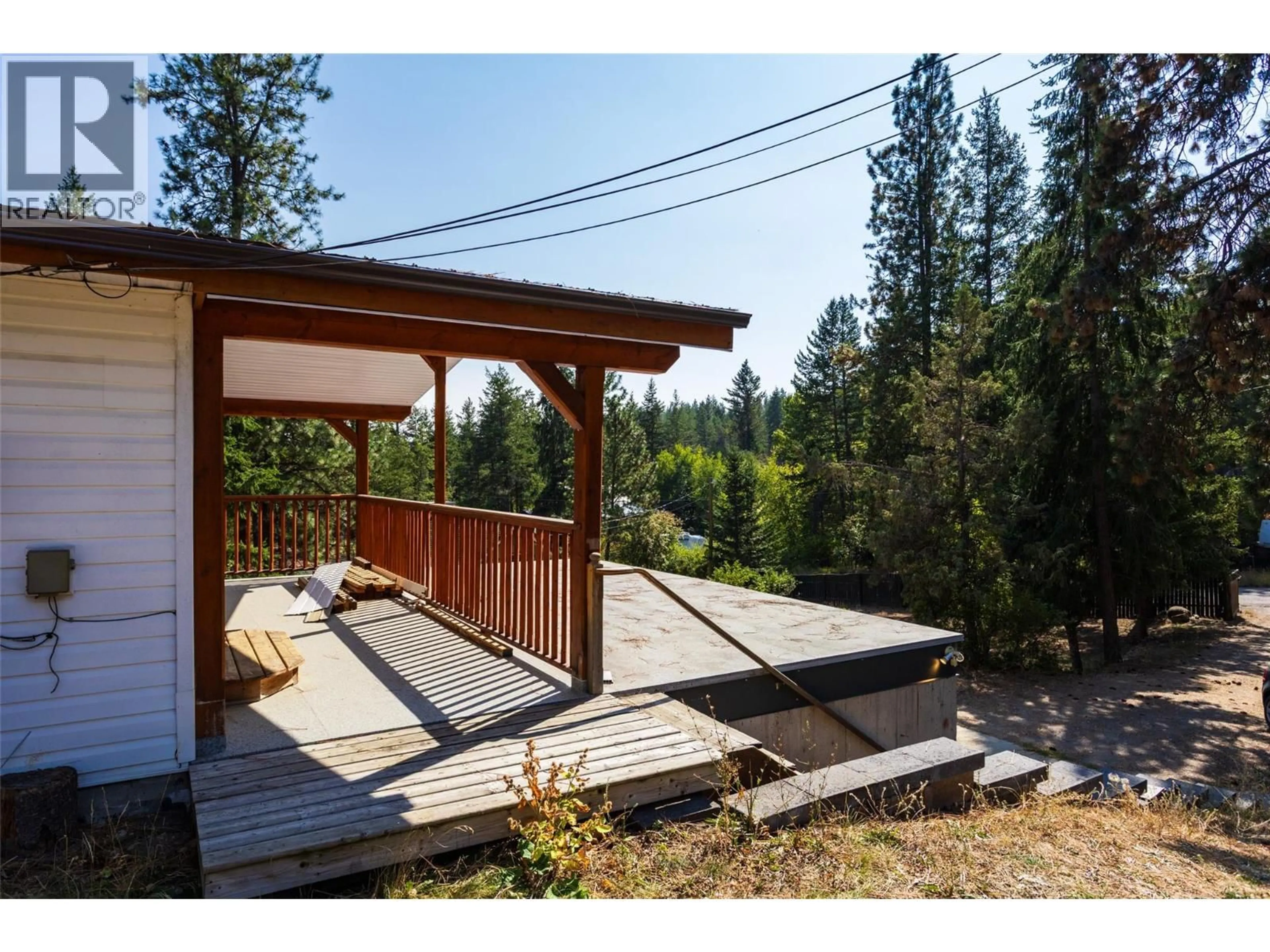 Patio, forest/trees view for 820 FIRWOOD ROAD, Kelowna British Columbia V1Z3V5