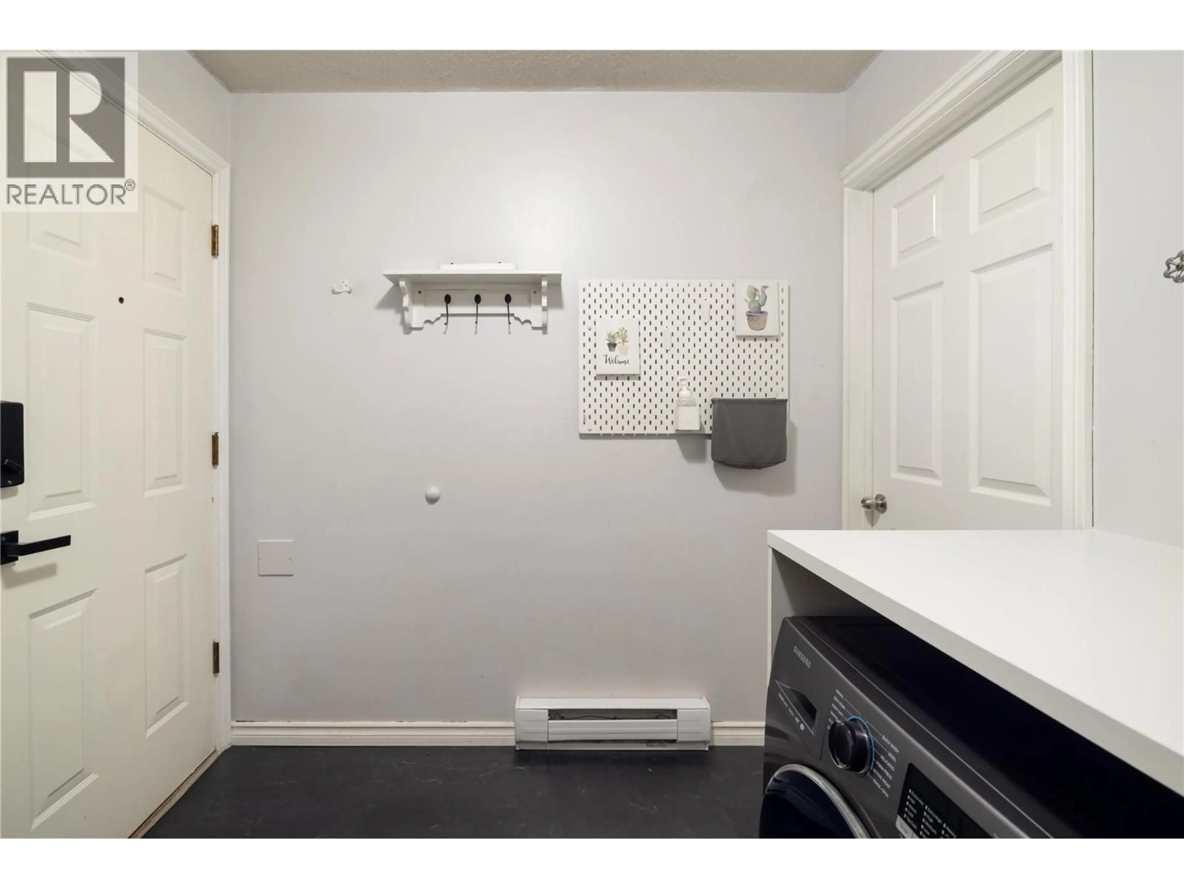 Laundry room for 1420 BERNARD AVENUE, Kelowna British Columbia V1Y6R7