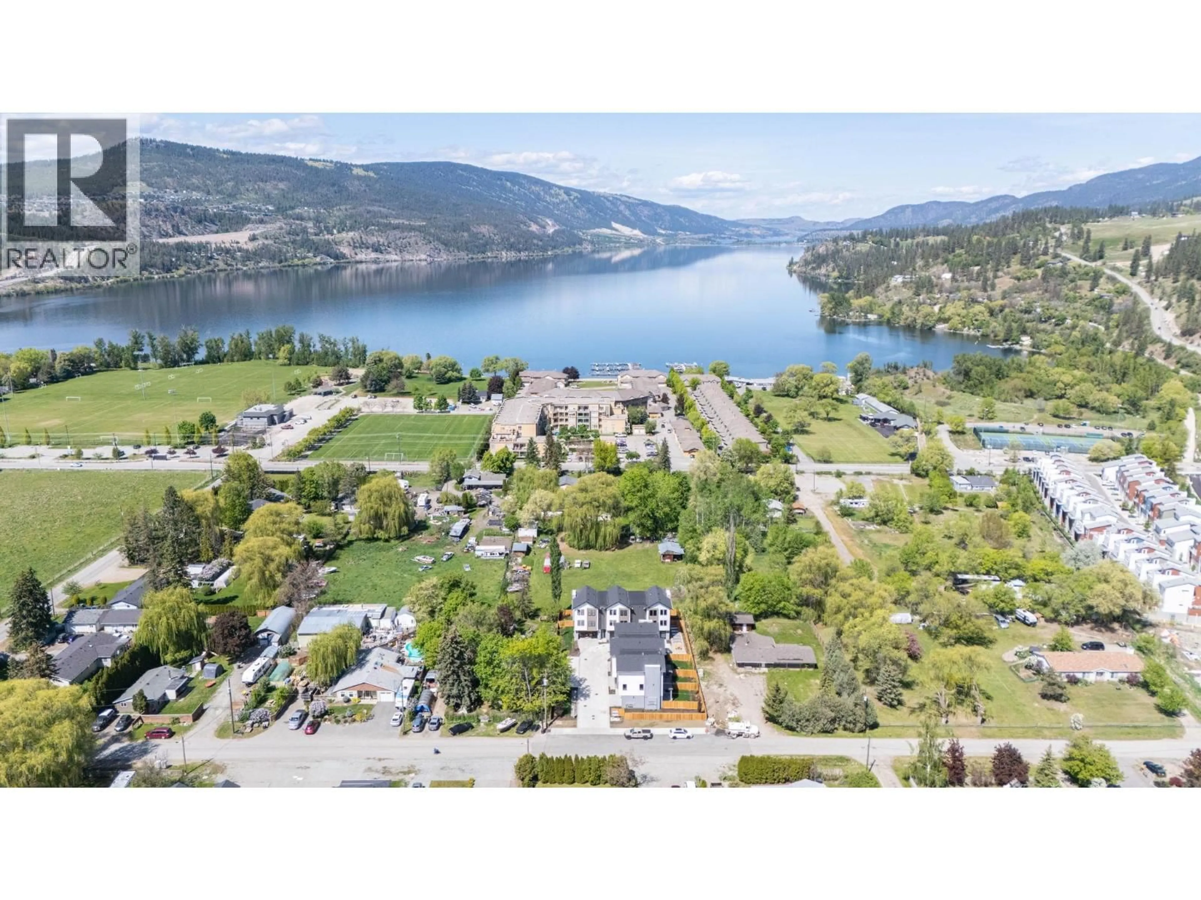A pic from outside/outdoor area/front of a property/back of a property/a pic from drone, water/lake/river/ocean view for 4 - 3590 REDECOPP ROAD, Lake Country British Columbia V4V1X5